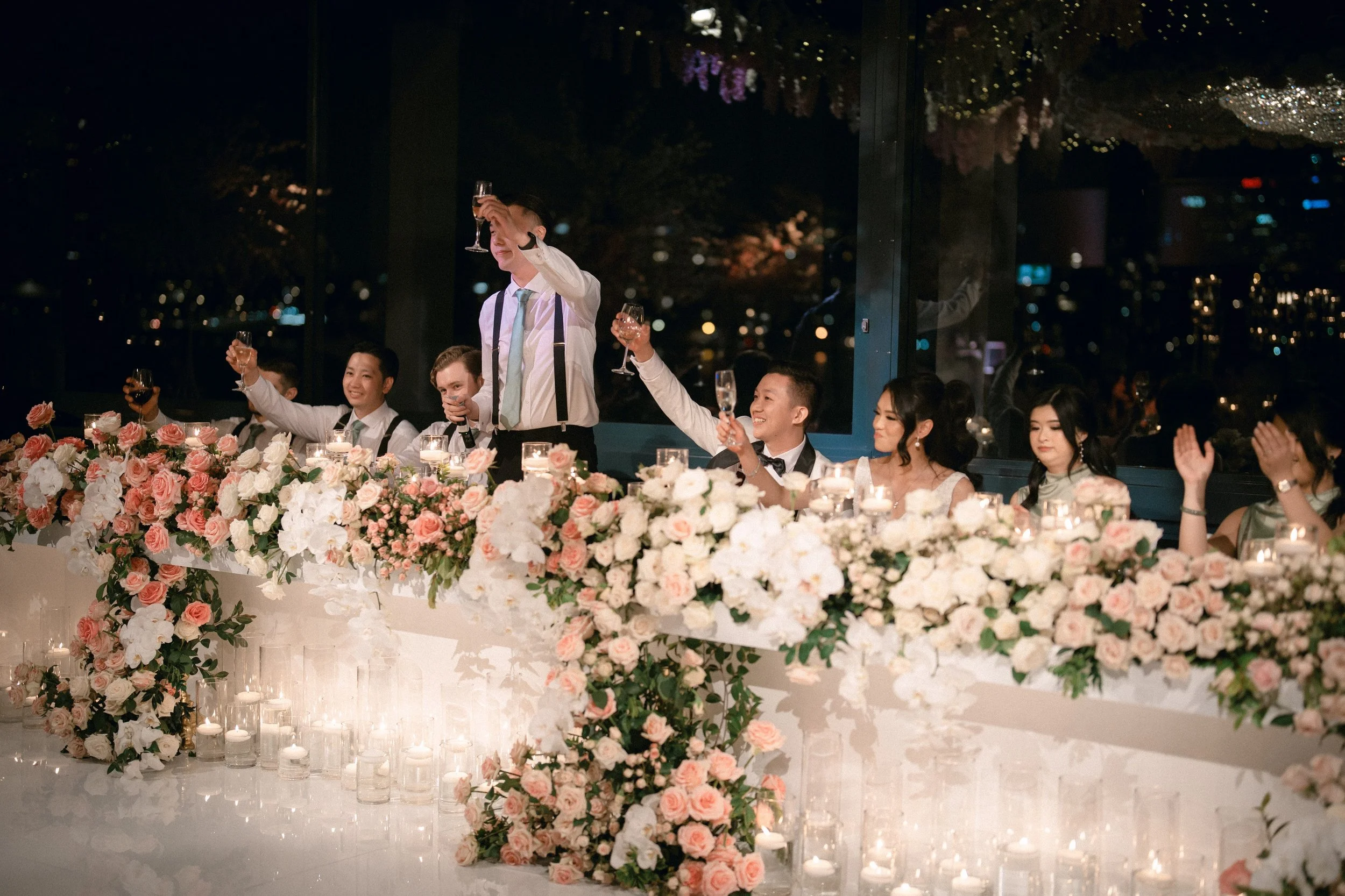 Romantic bridal table with cascading floral styling.