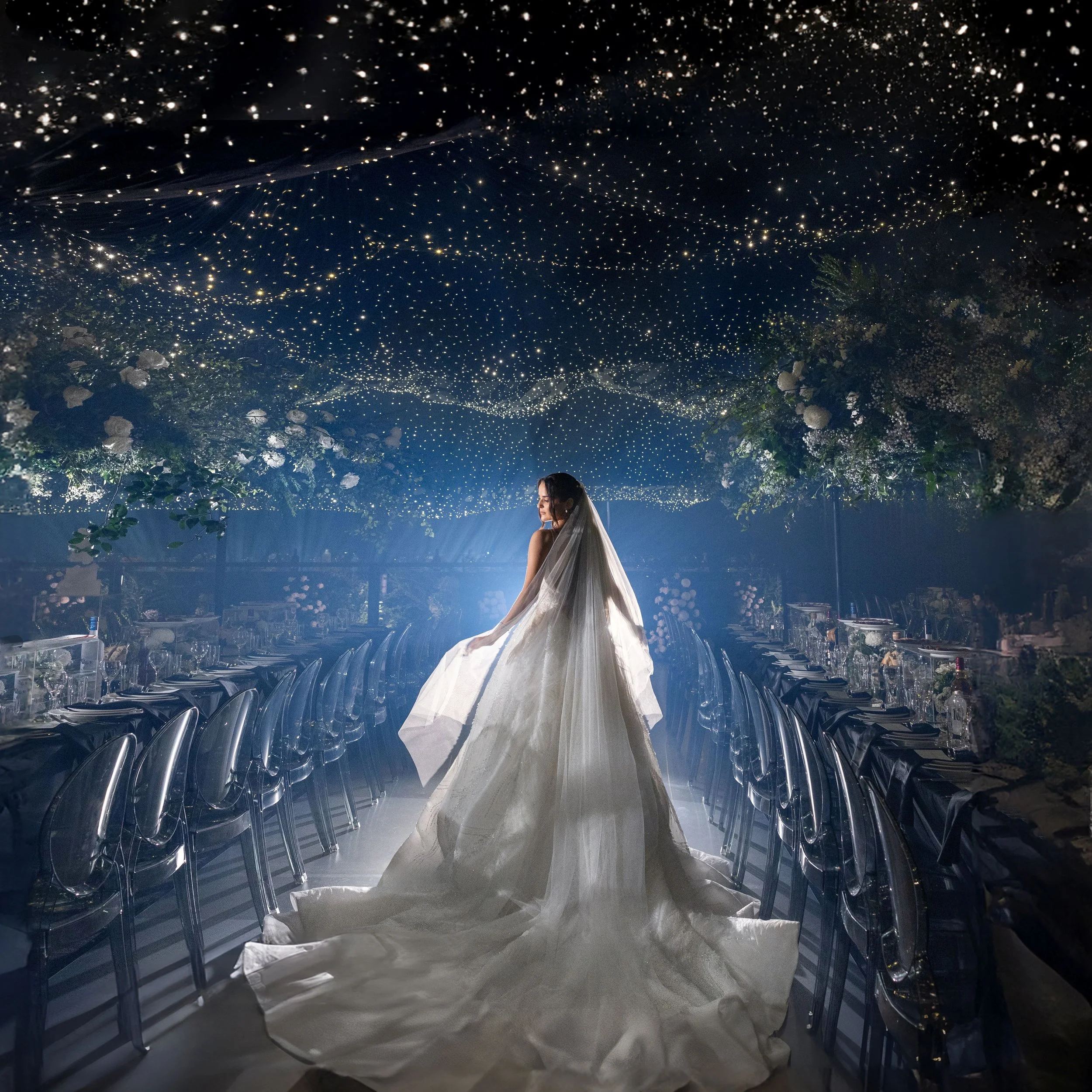 Bride in white gown walking across the dancefloor with starry night ceiling at sydney wedding.