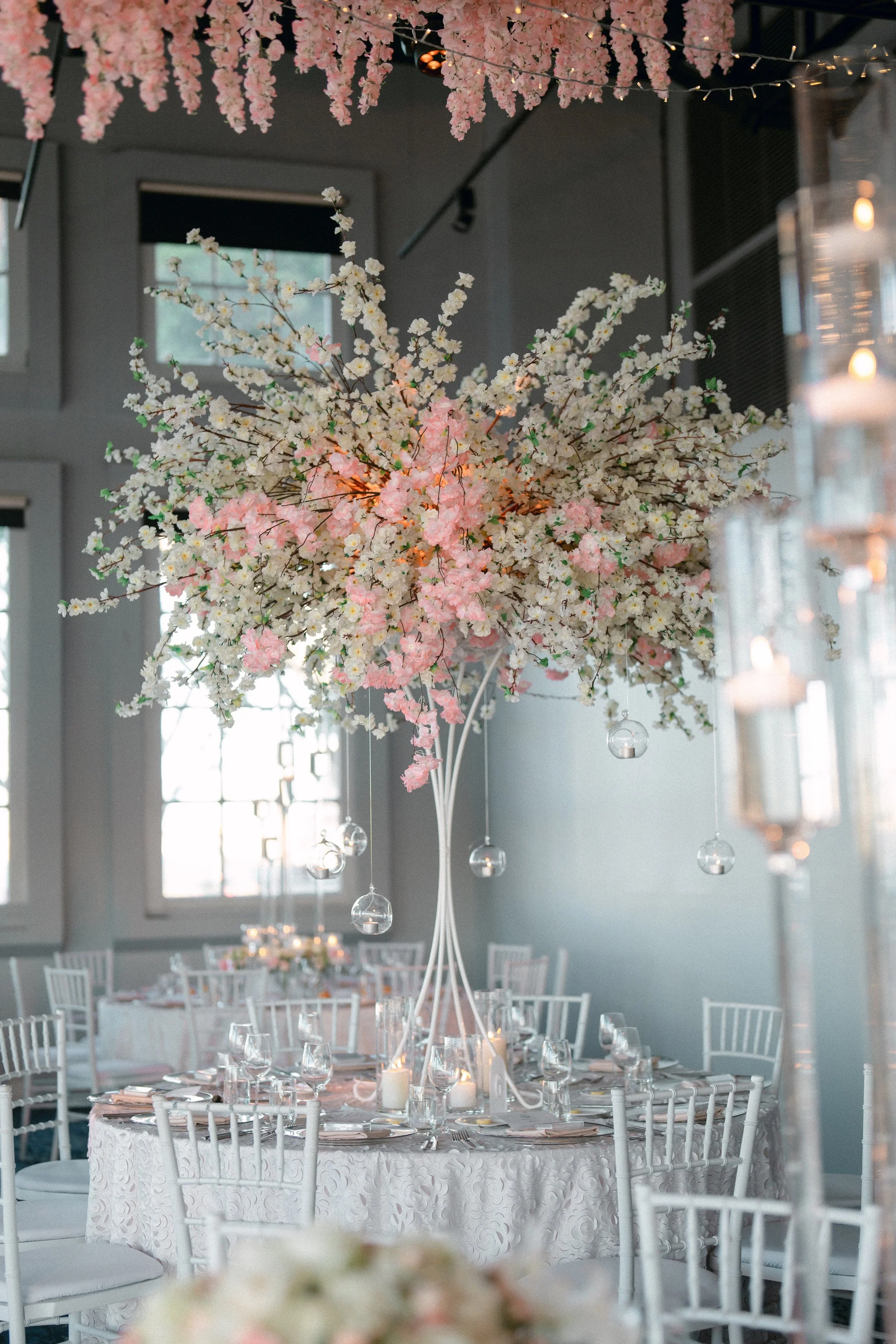 Luxury flower centrepieces on round guest tables