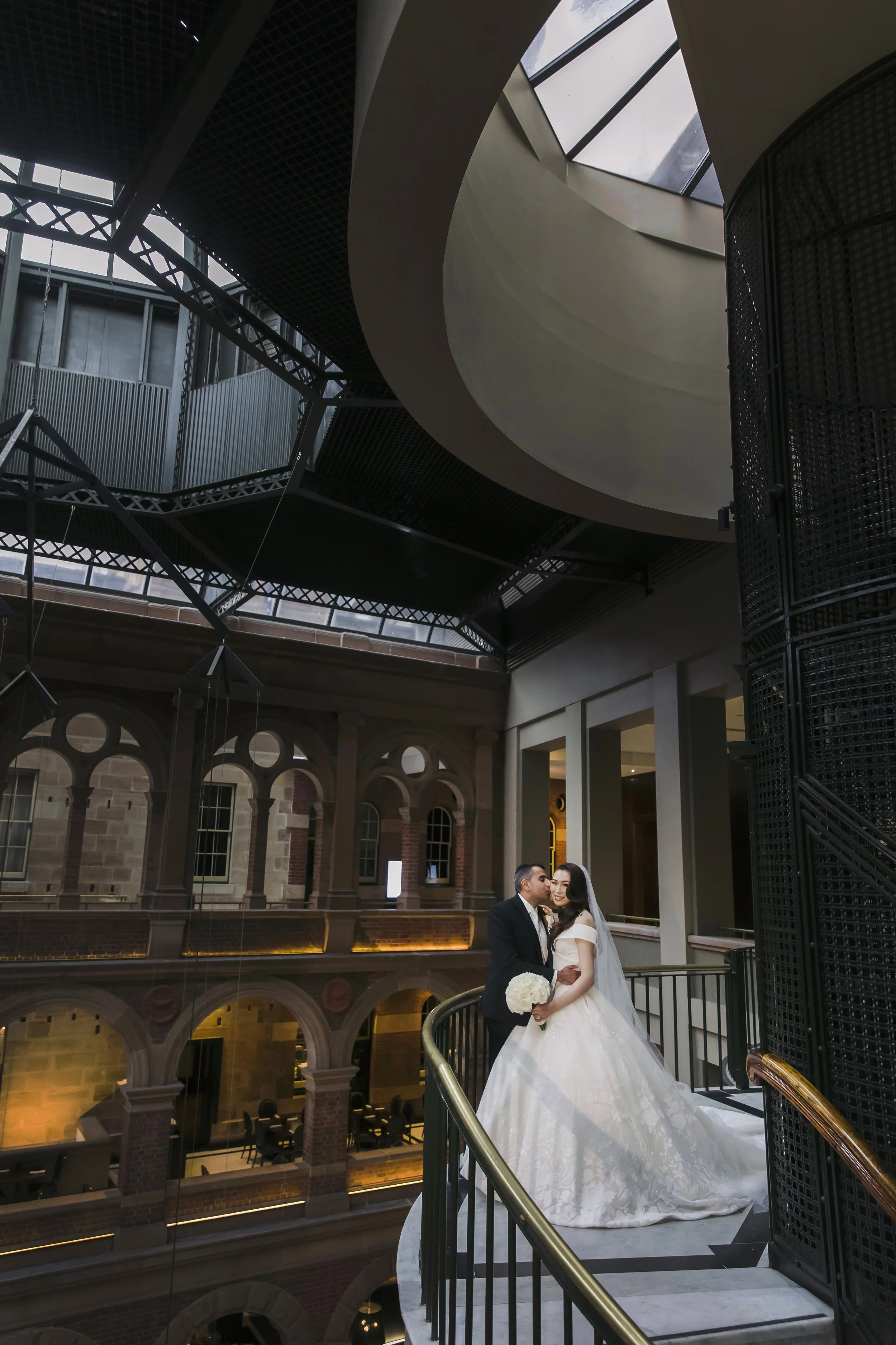 bride-and-groom-romantic-portrait-staircase.jpg