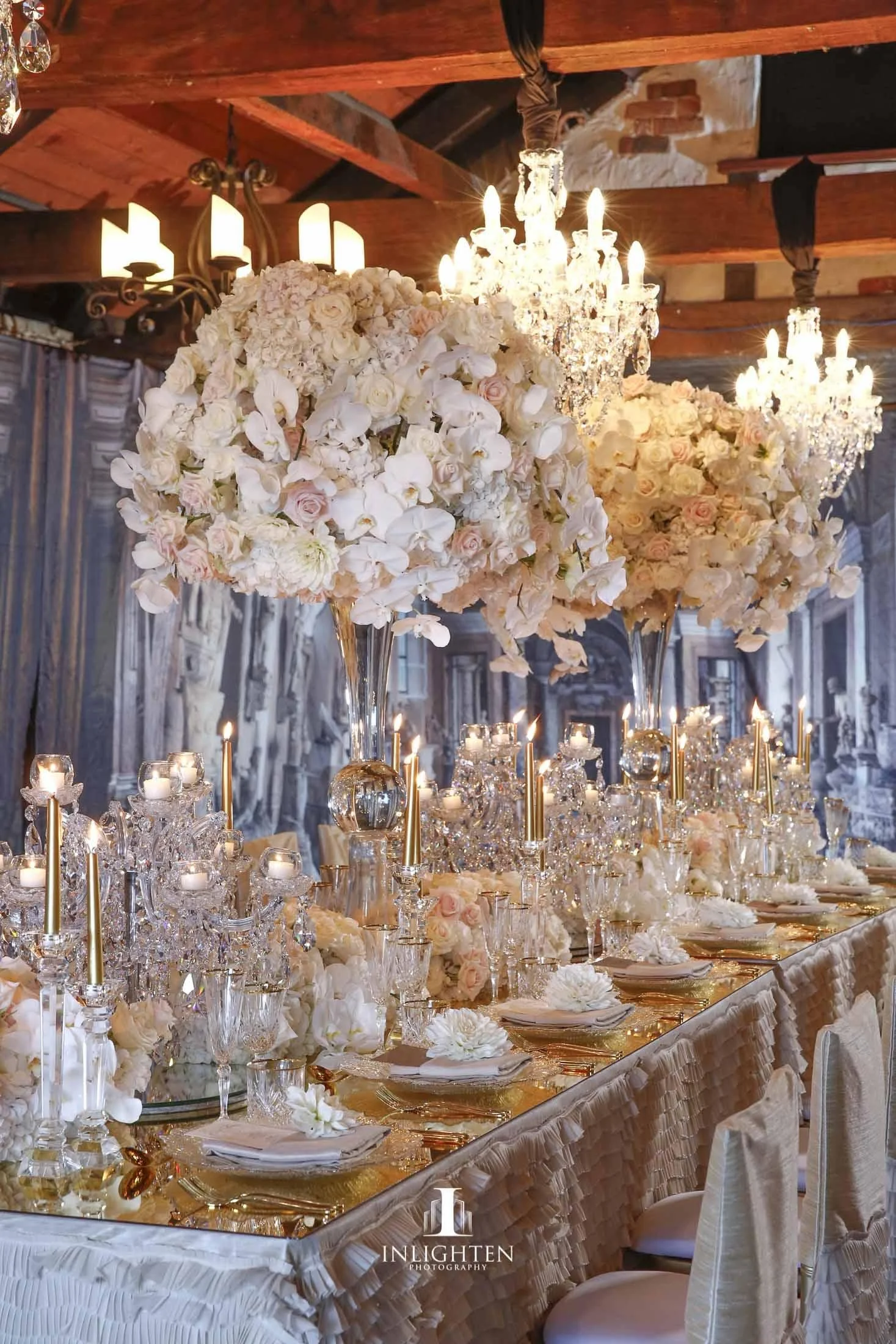 Rental_luxury_linen_hire_sydney_Gold mirror top, double vase with oversized florals, crystal chandeliers and charger plates.jpeg