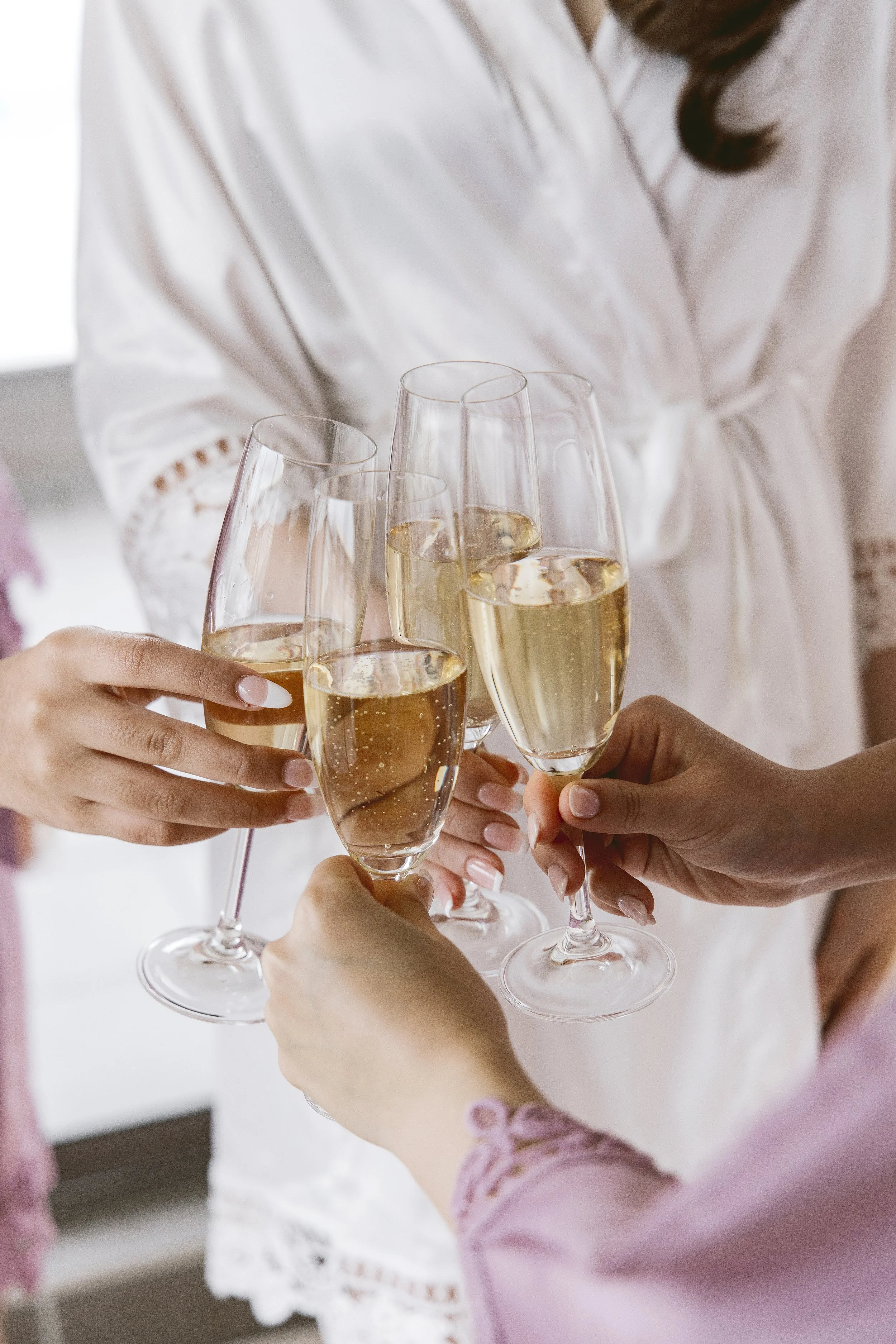 champagne-toast-bride-bridesmaids.jpg