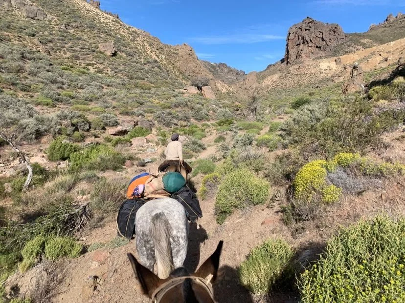 Entering the valley of the caves and springs.