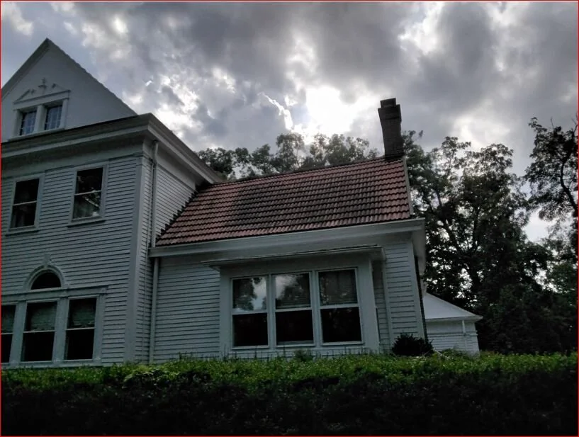 dirty tile roof front view