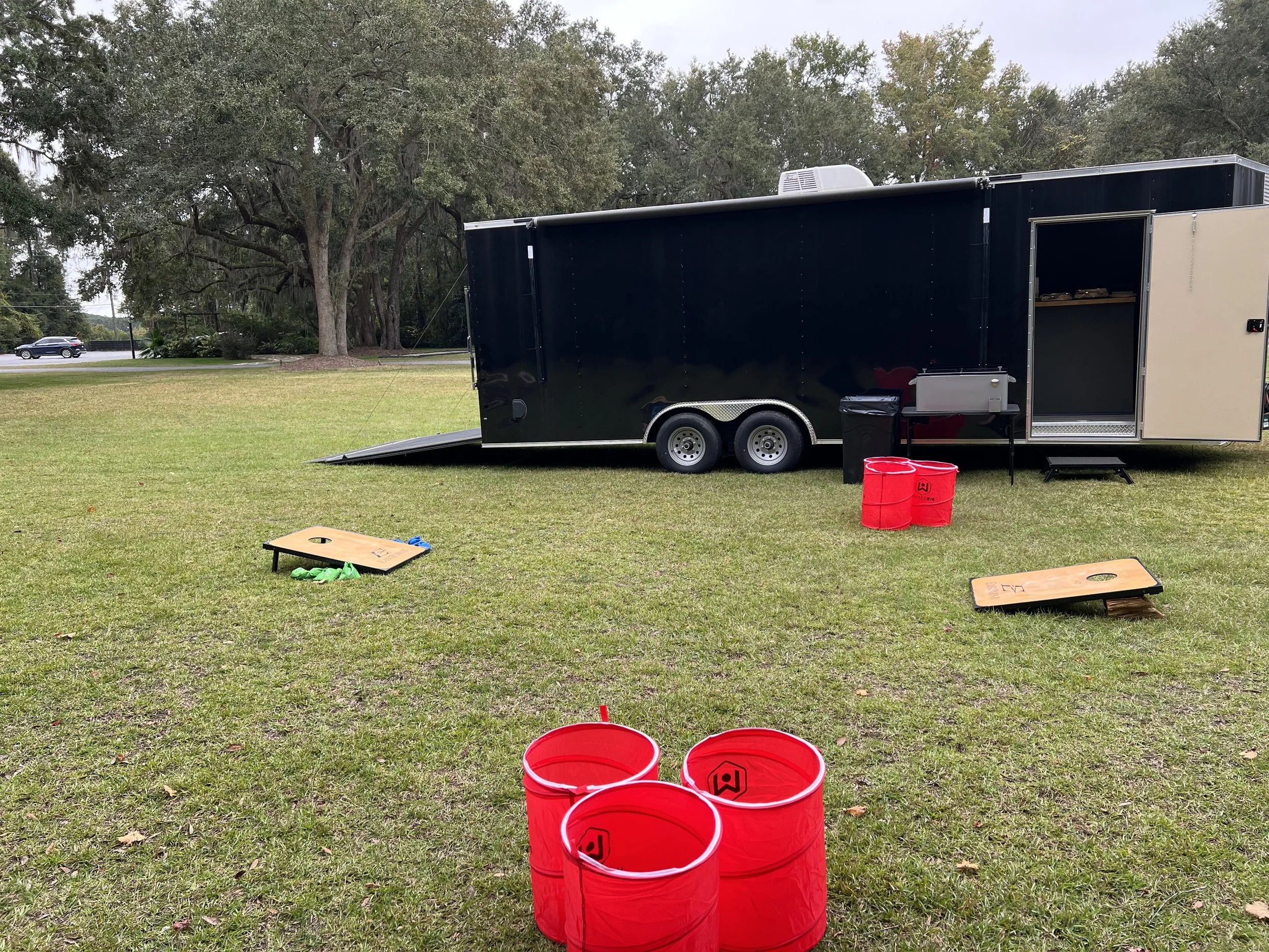 aos-mobile-lounge-exterior-games-cornhole.jpg