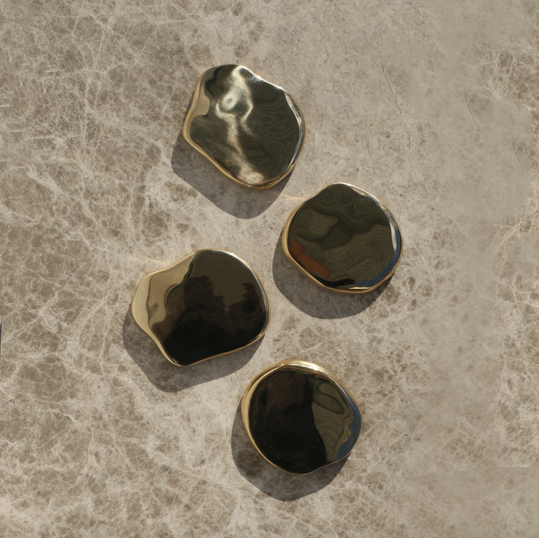 Brass Cocktail Coasters, by Corey Ashford