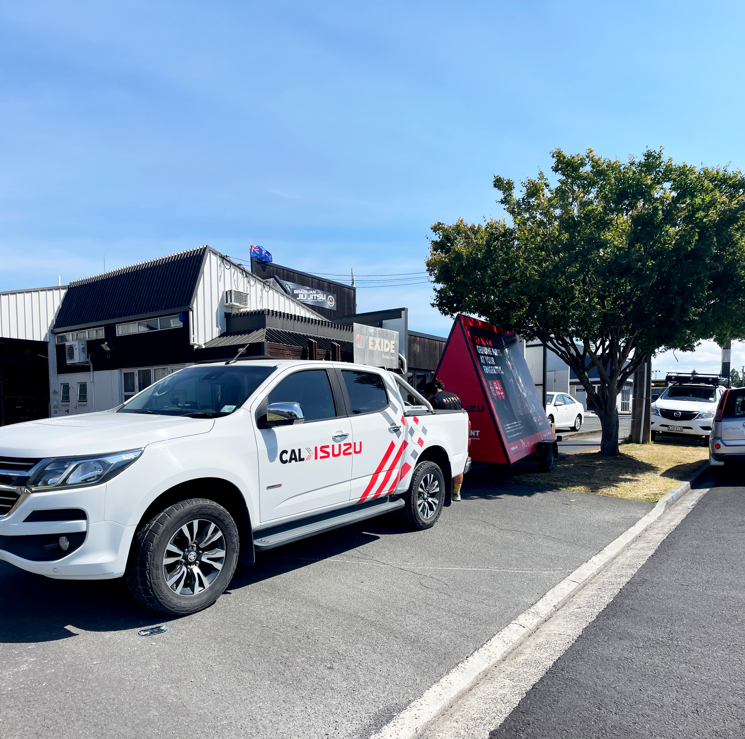 Cal Isuzu Ad trailer and ute 2.png