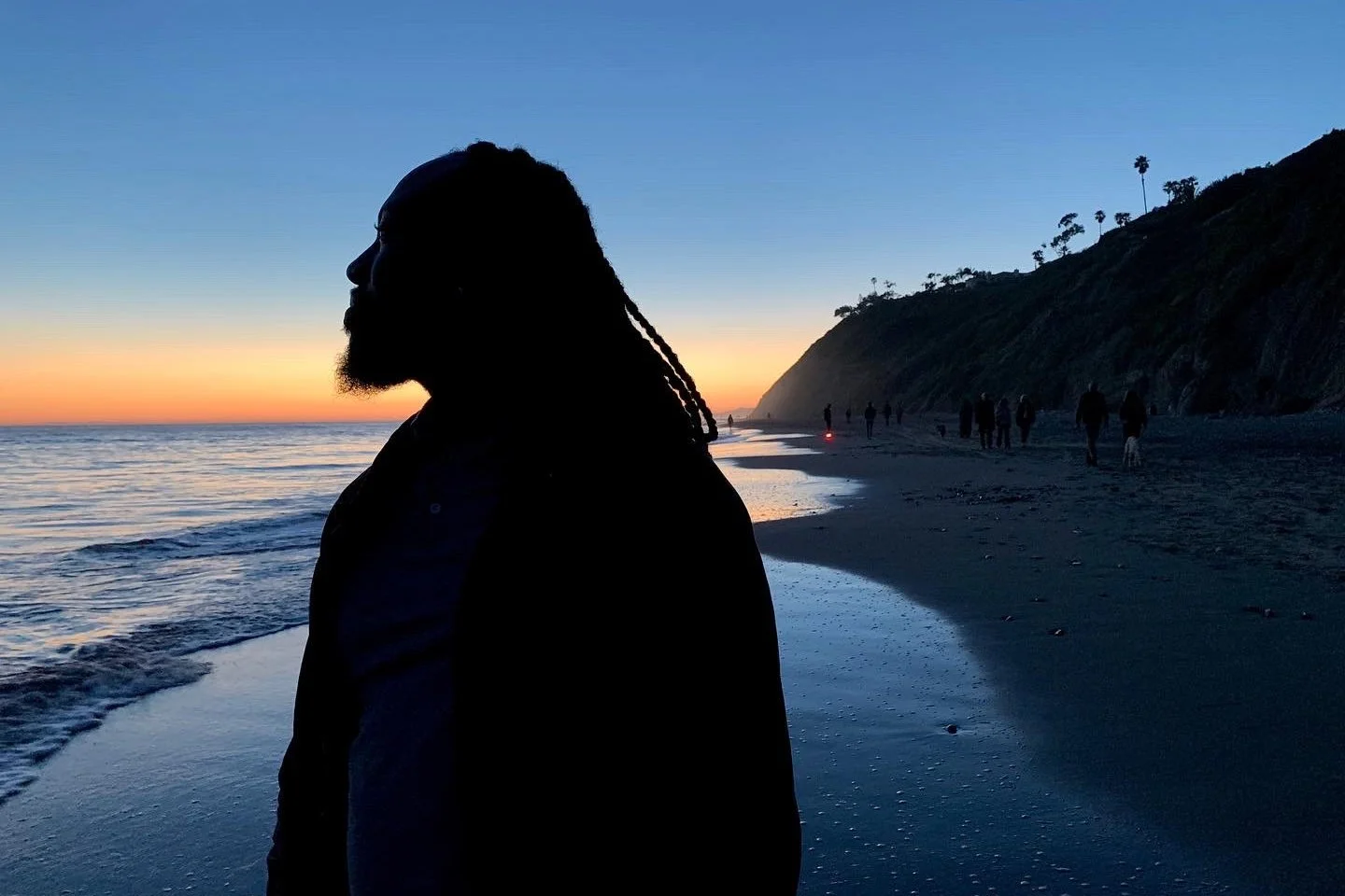 Corey on beach 54388749-A32C-40DB-8E27-2A87ABF59447 for website.jpg