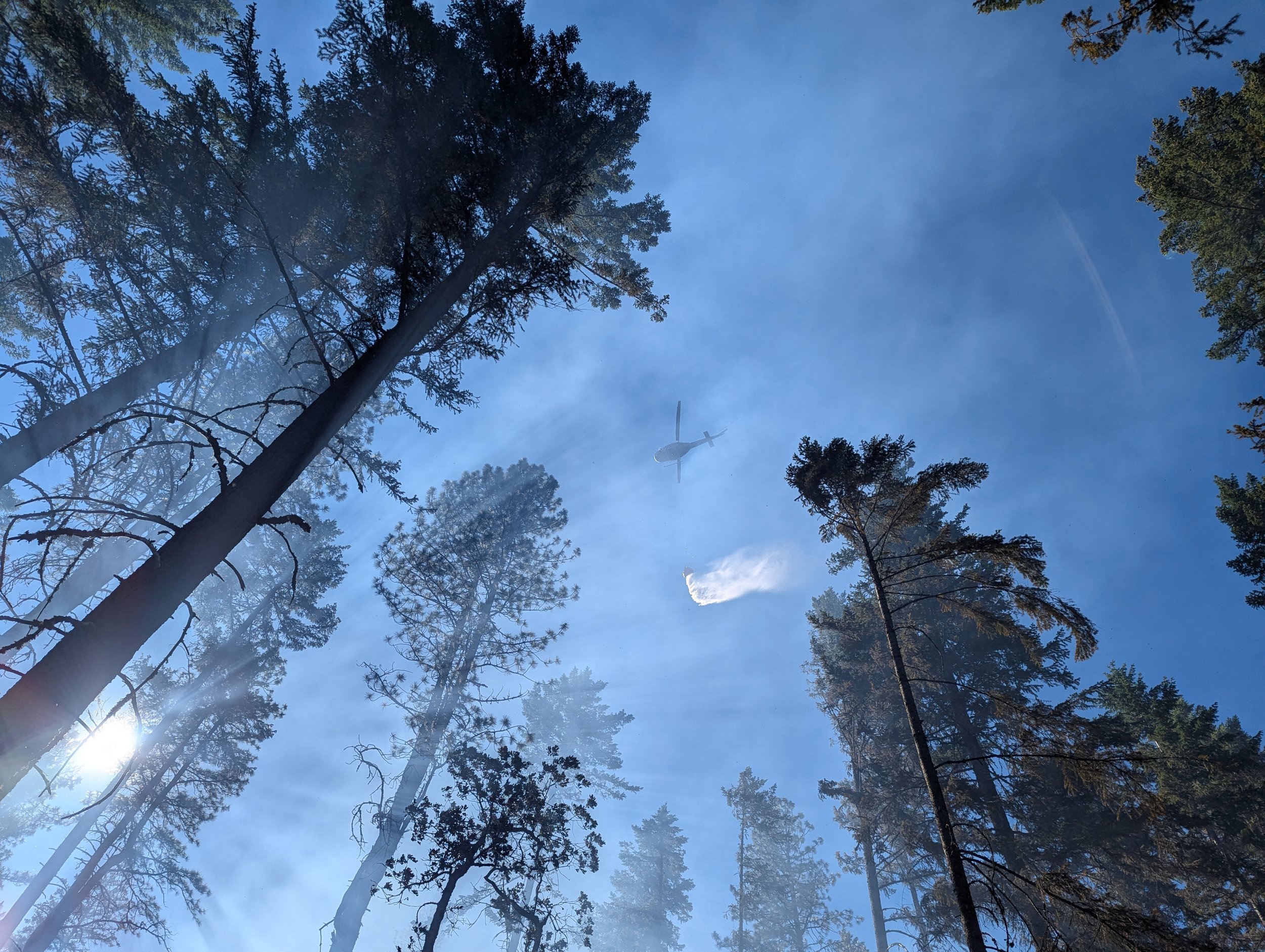 DNR helicopter providing aerial water support during a fire near Long Road in Wahkiacus. June 23, 2024