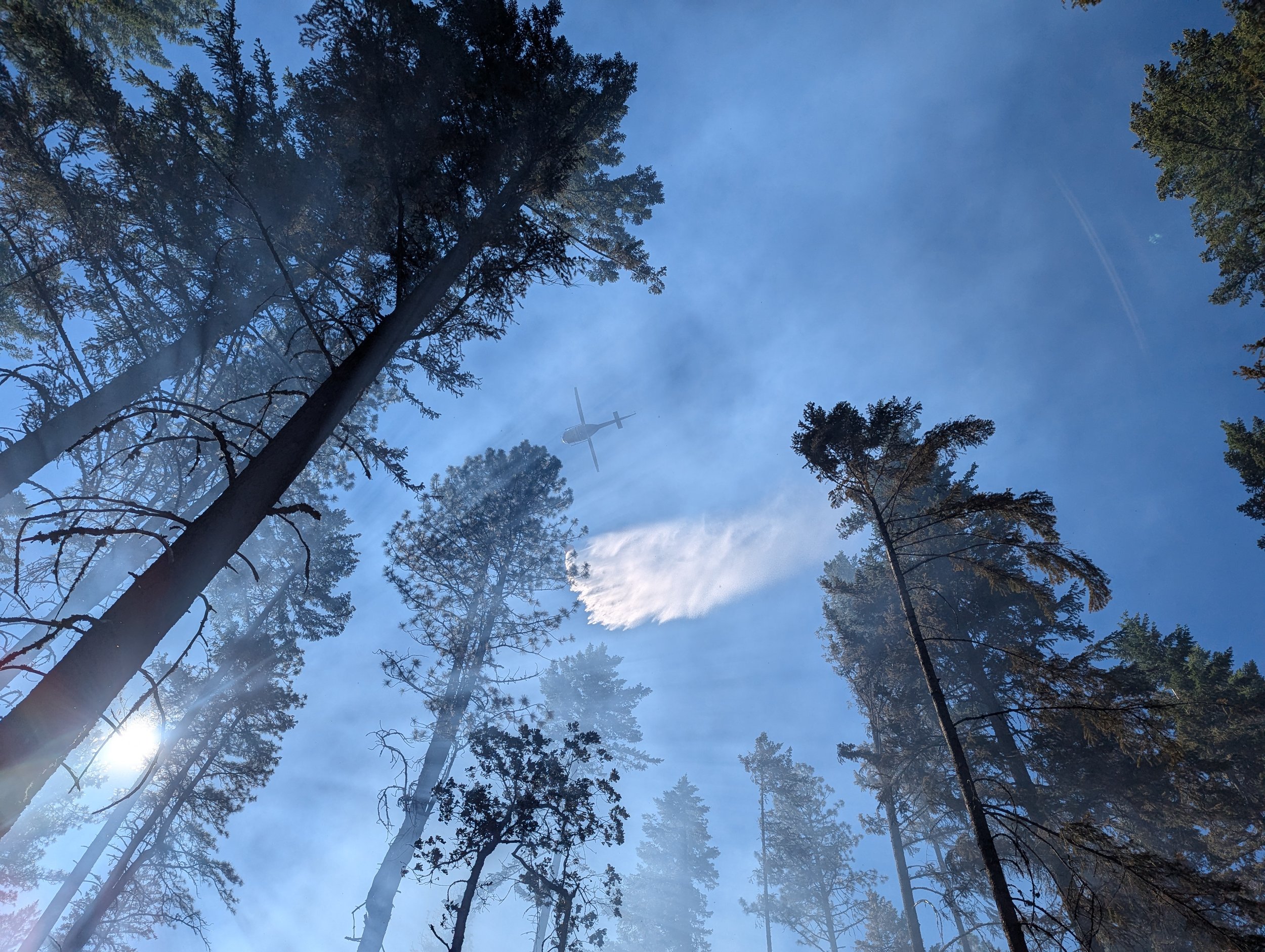 DNR helicopter providing aerial water support during a fire near Long Road in Wahkiacus. June 23, 2024