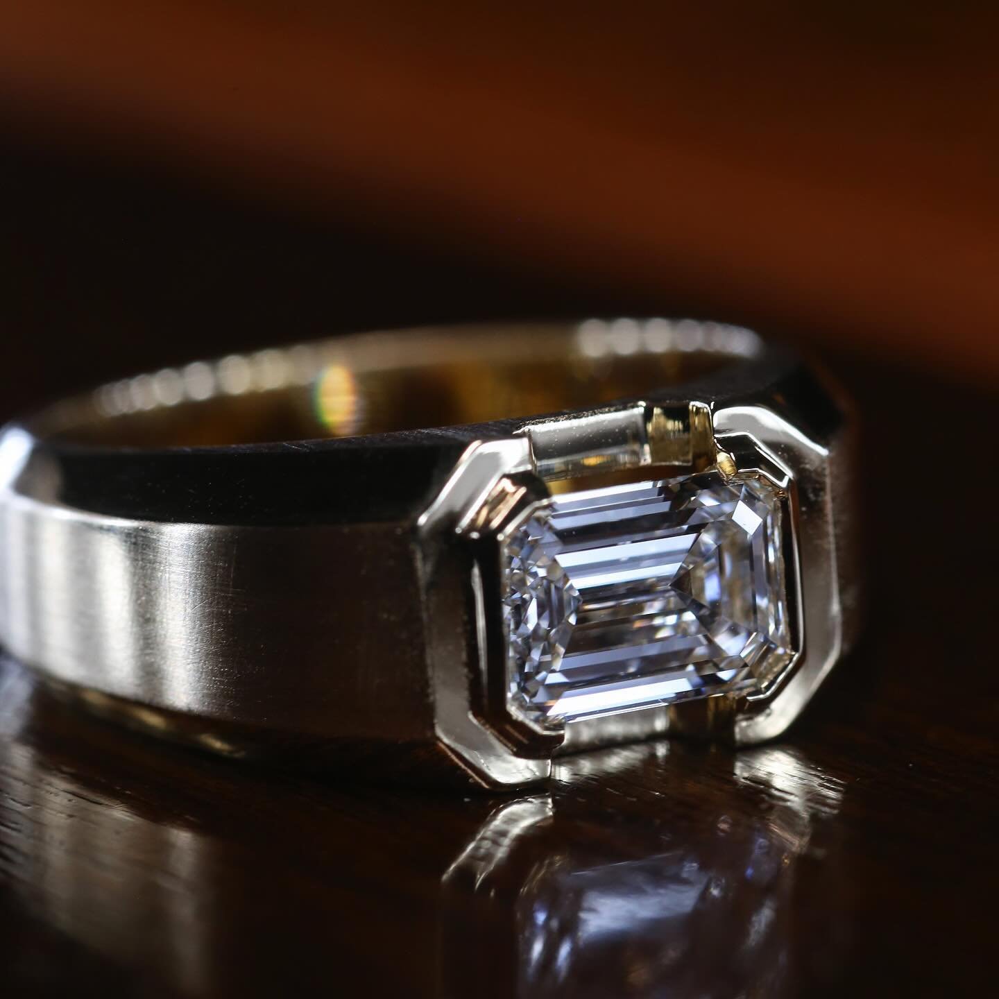 Mens wedding bands can also make a statement. Check out this 1.50ct emerald cut diamond rub-over set in to a chunky yet sleek 18k yellow gold ring. 

#diamond #engagementring #diamondring #passion #craft #finejewelry #diamondring
