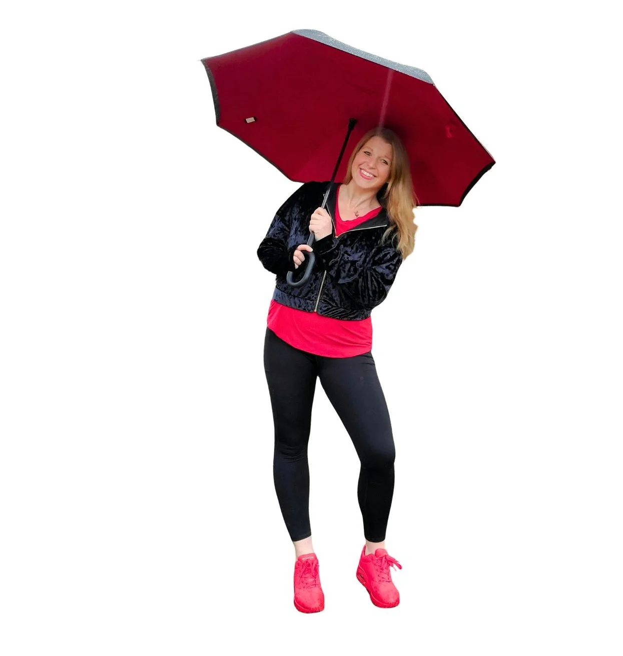Maggie Poppins ADHD Professional Home Organizer Systems Strategist in Rochester, NY, holding an umbrella