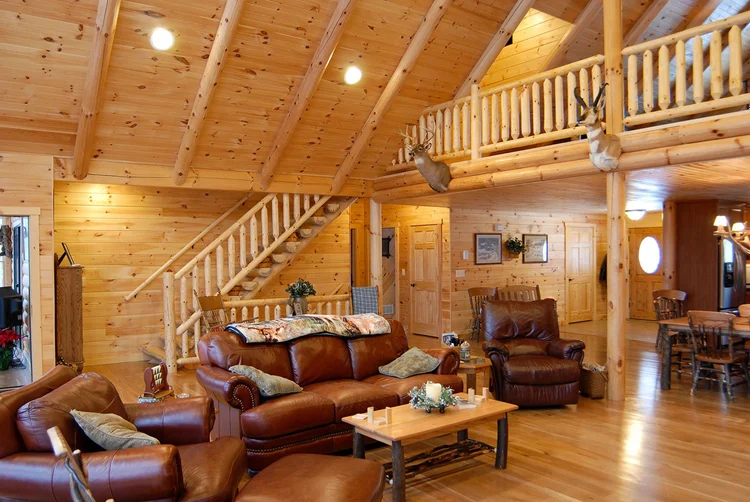 Henry log home front with covered porch and log posts