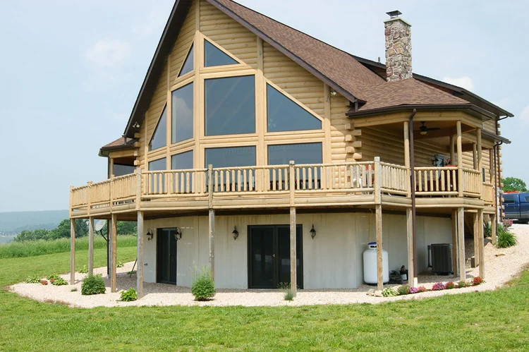 Aldinger log home front entry with stone accents