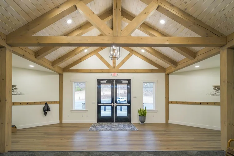 JCC final view of custom timber-frame entrance