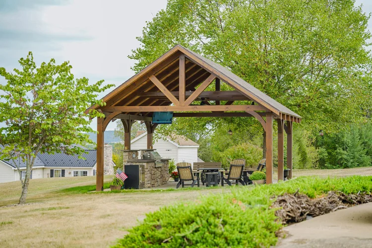 Pavilion with stone fireplace for outdoor entertaining