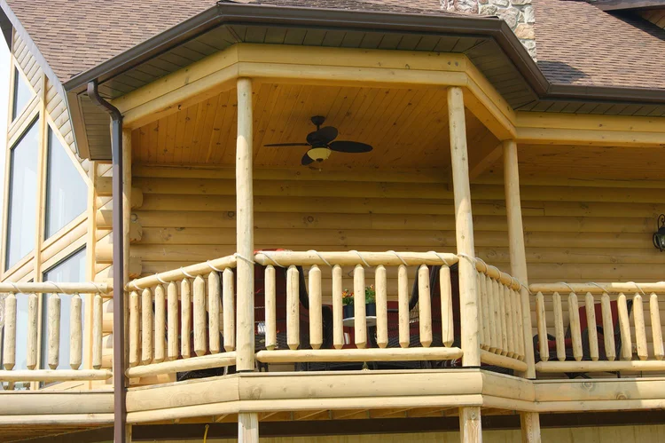 Aldinger log home rear deck overlooking yard