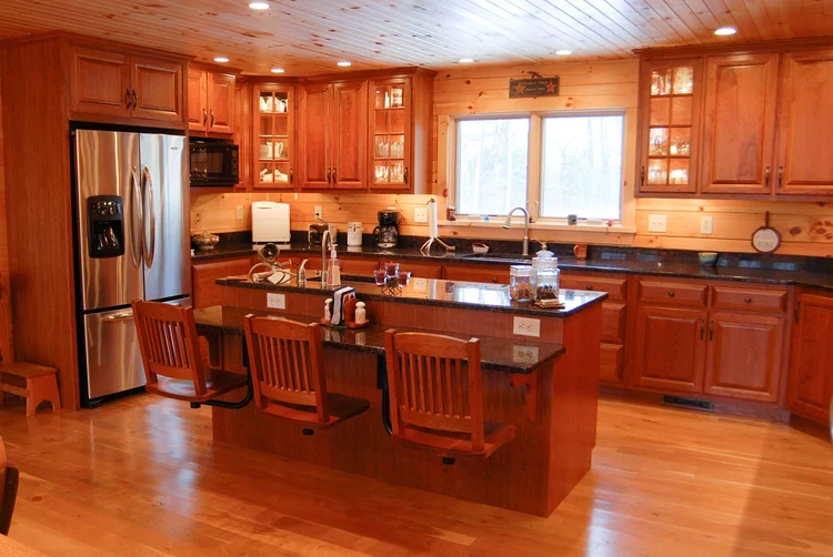 Henry log home interior with open beam ceiling