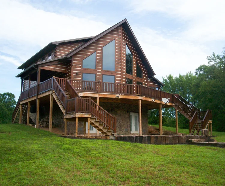 Conway custom log home exterior by KSM Log Homes and Timber Packages