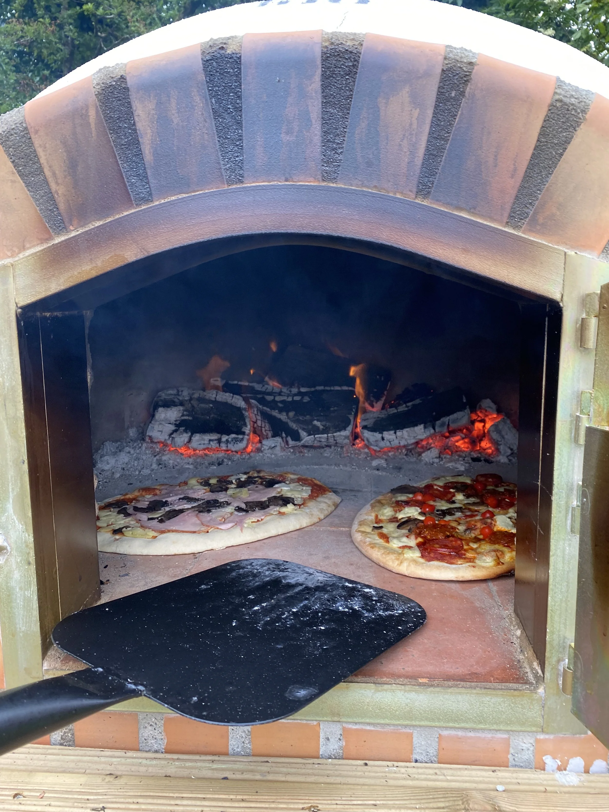 wood fired pizza oven camping bell tent camping north devon