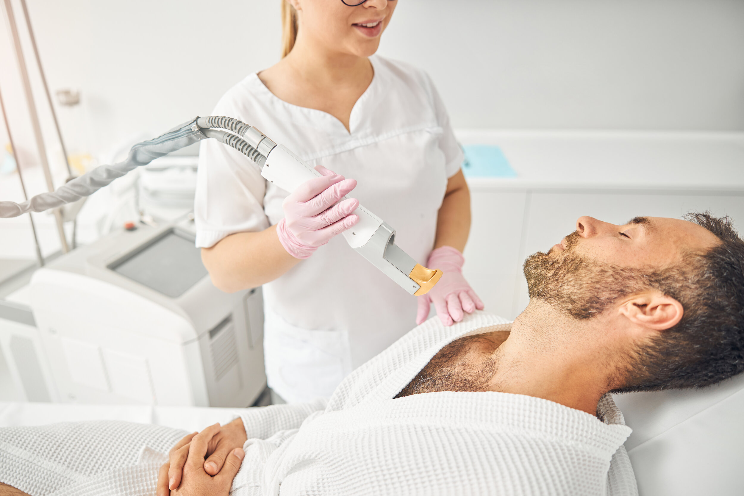 handsome-young-man-having-laser-hair-removal-proce-W9QMSLS.jpg