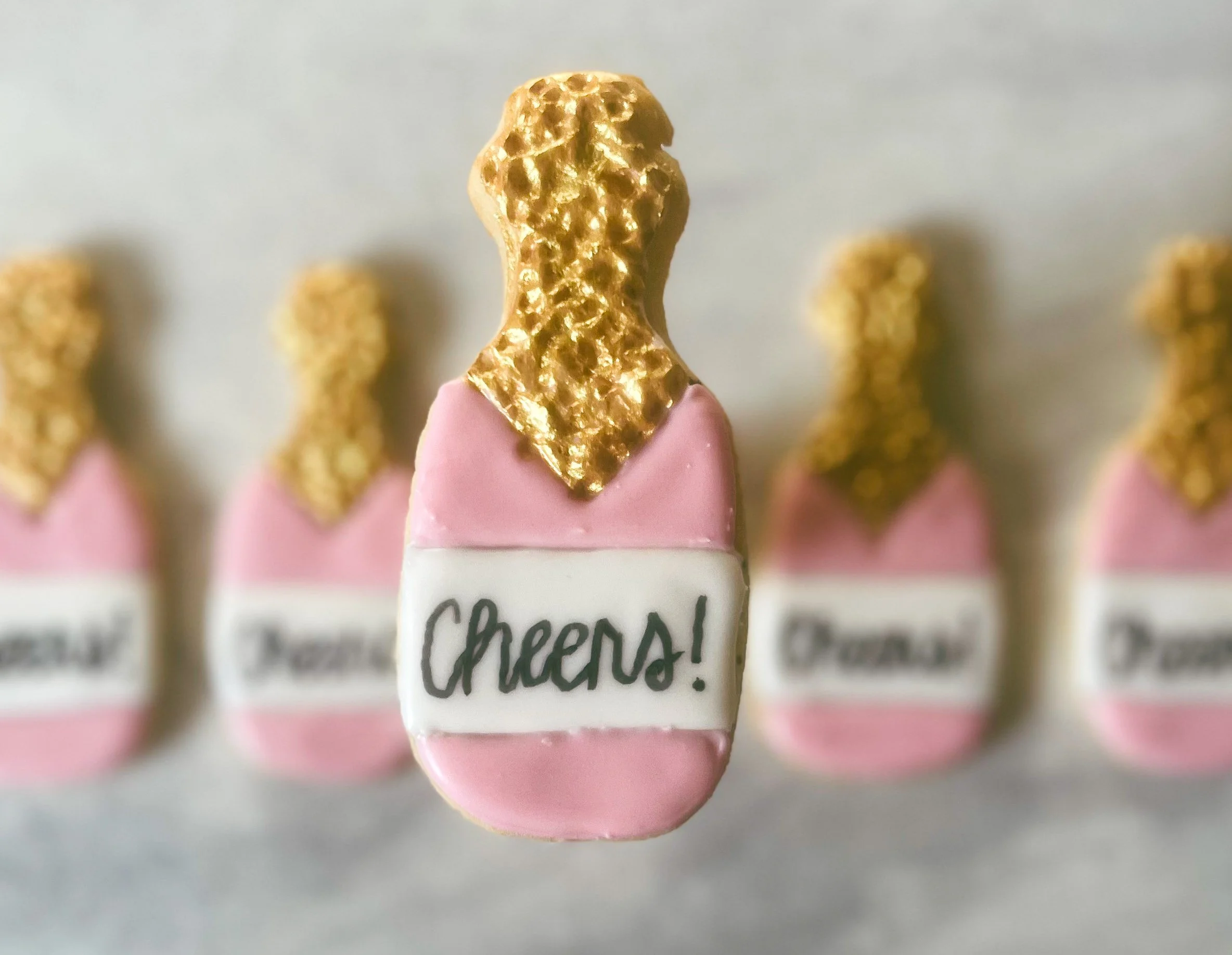 Pink and Gold Champagne Bottles 2024.JPG