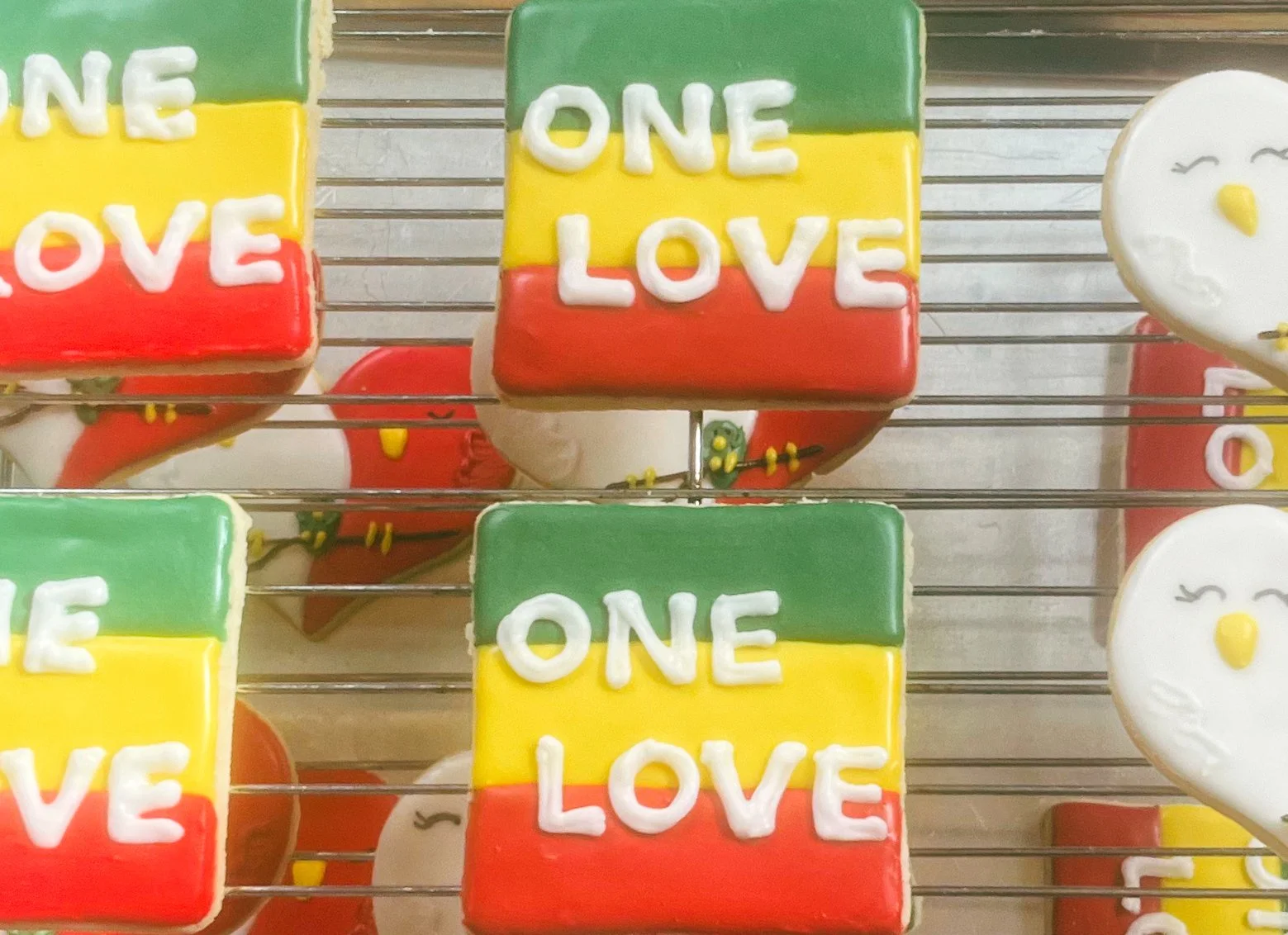 One Love cookies for a sweet one year old who loves Bob Marley.