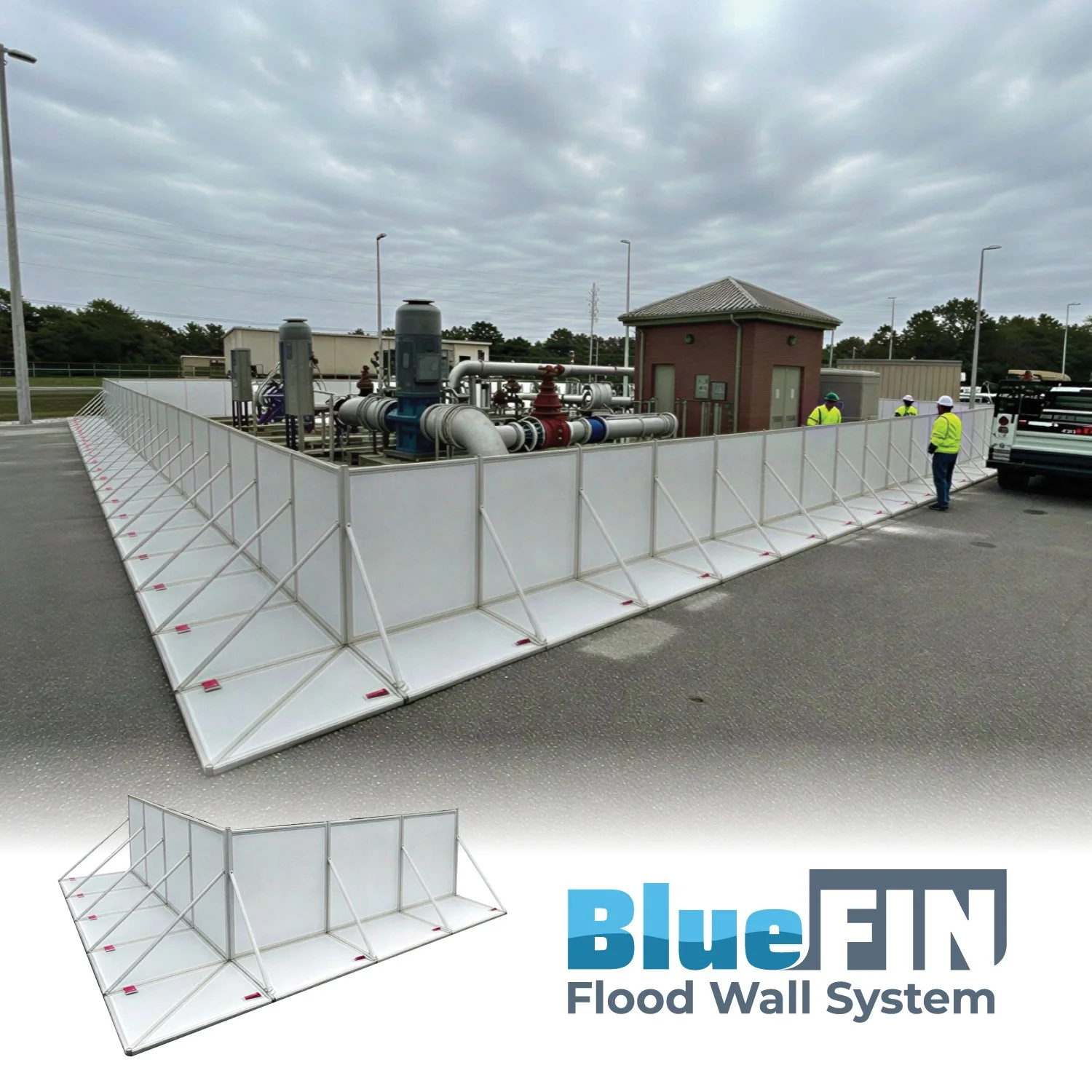 Deployment of a flood barrier system surrounding utility equipment, with three workers in safety vests and helmets standing nearby. The sky is overcast.
