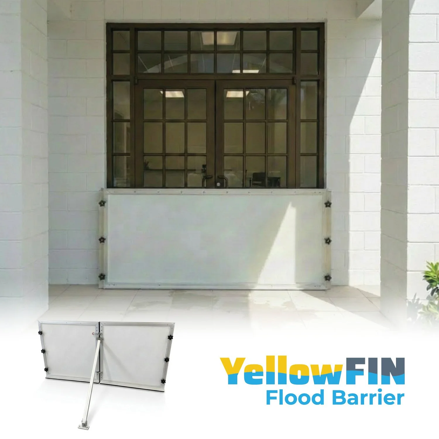 A yellow flood barrier with black fasteners, displayed in front of a window and wall with the text 'YellowFIN Flood Barrier' at the bottom.