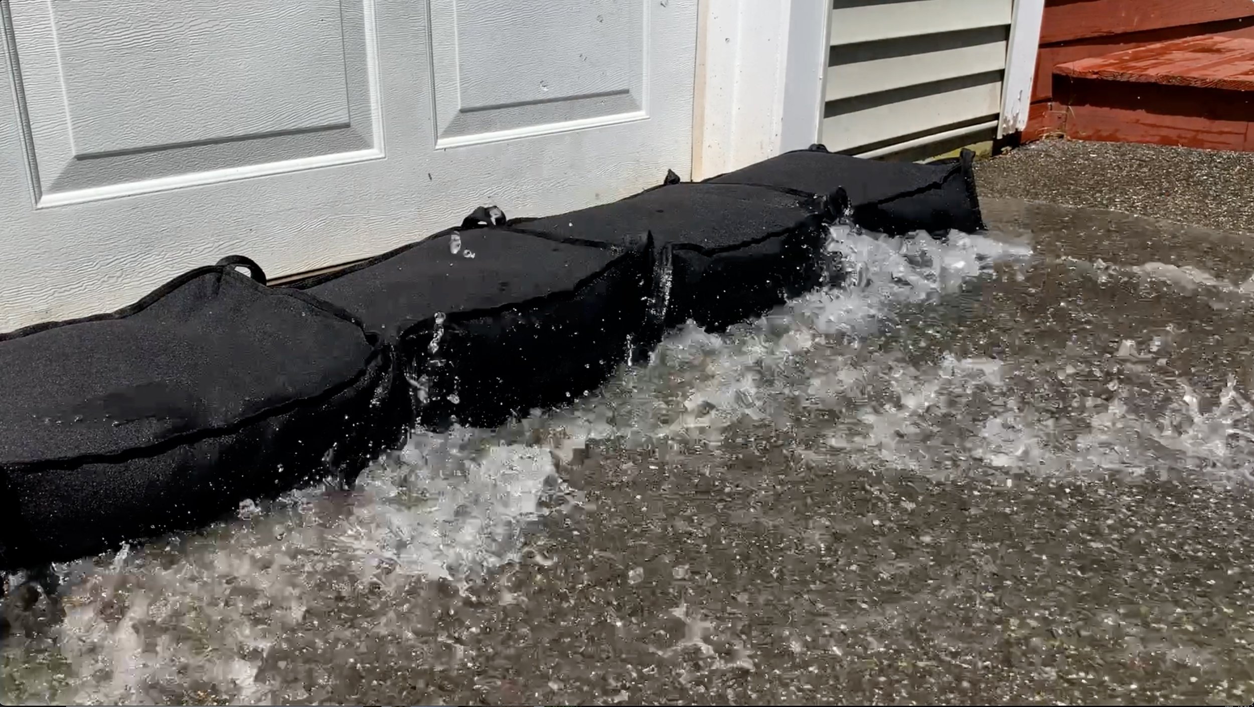 Floodbag holding back water