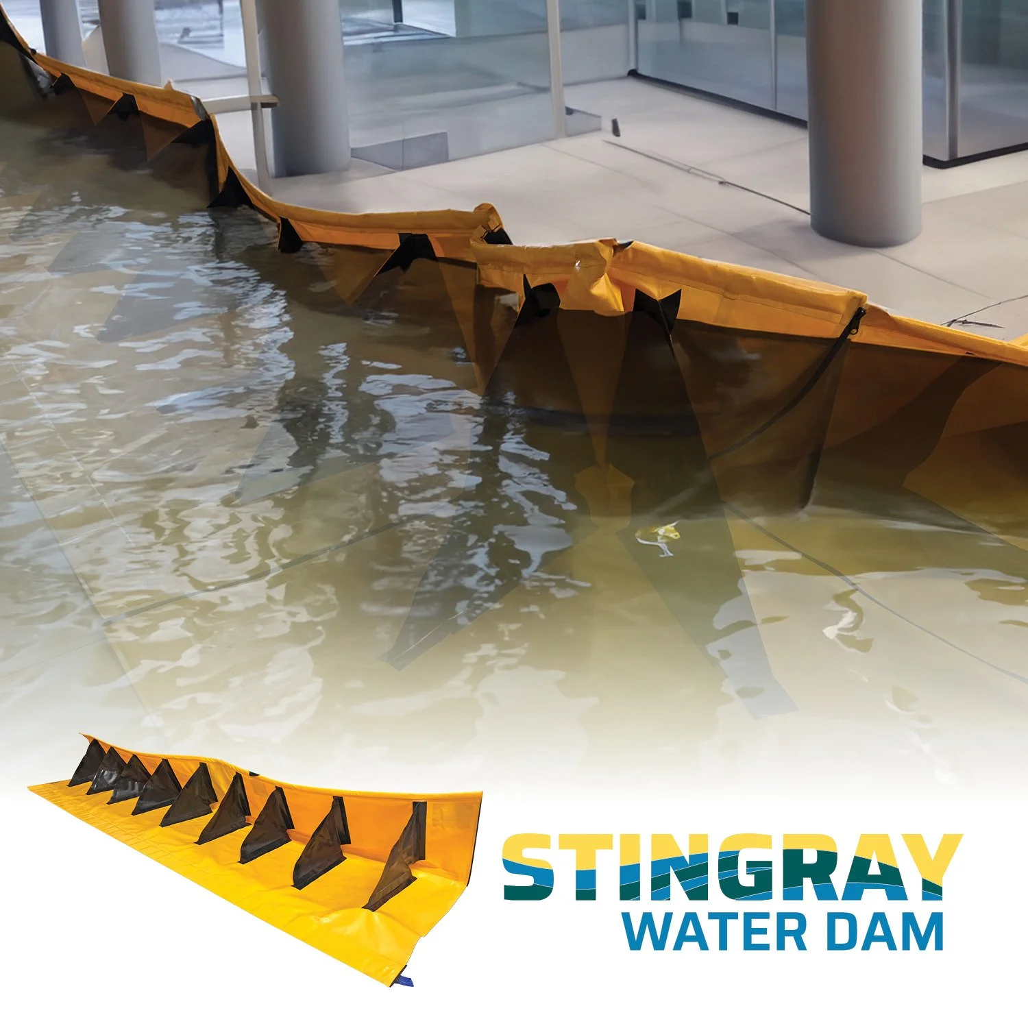 An orange water barrier with black and orange fins in a flooded area at an airport, with the words 'STINGRAY WATER DAM' printed below.
