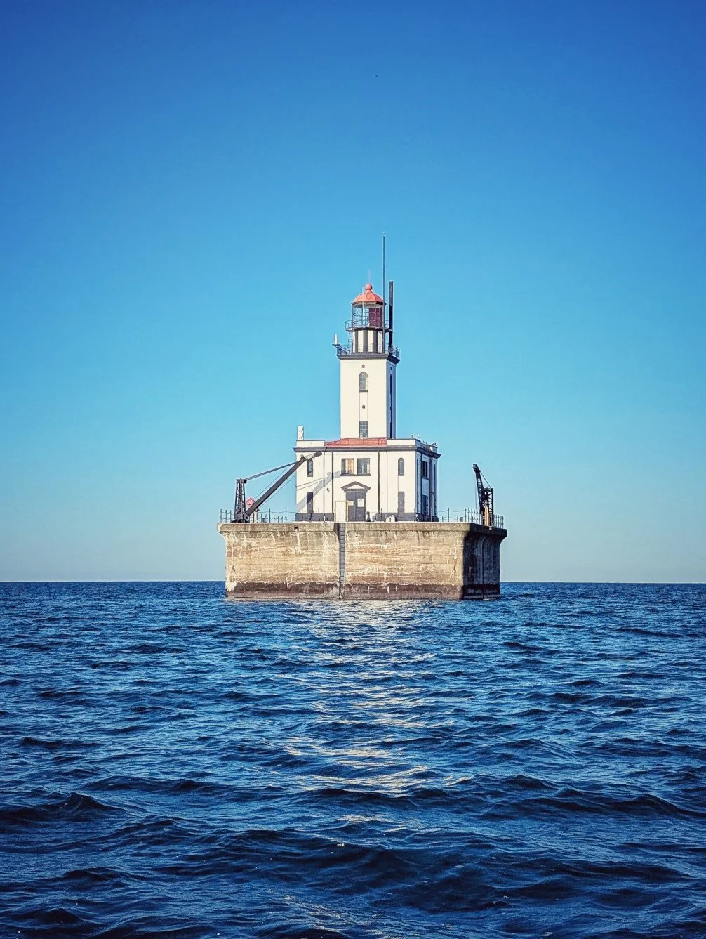 The iconic Detour Reef Light as seen from a Reel Fish'n charter boat during a fall lake trout and perch excursion near Drummond Island, Michigan.   