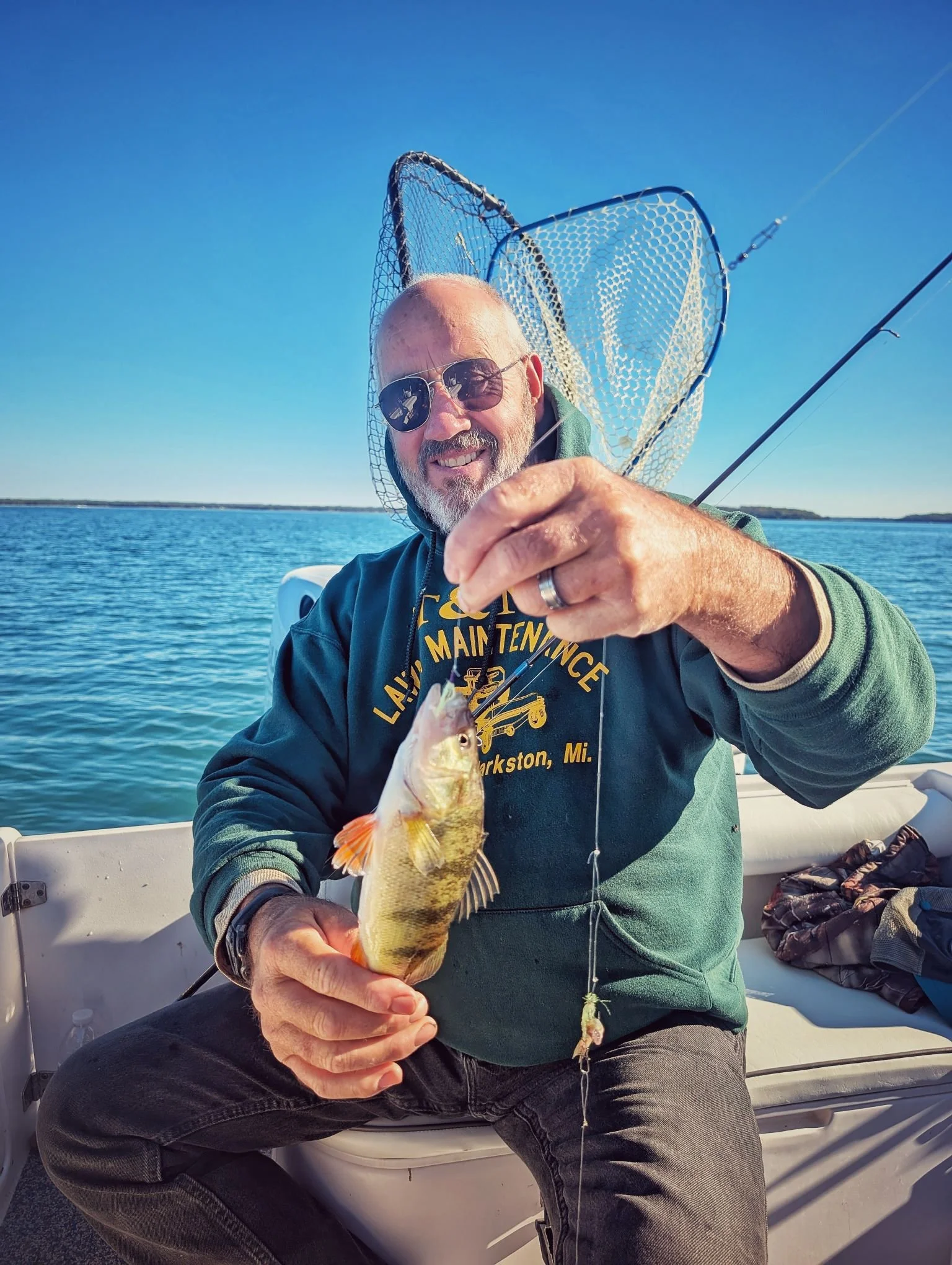  Showcasing a solid "eater" yellow perch caught on a sunny October morning while fishing Drummond Island with Reel Fish'n.   