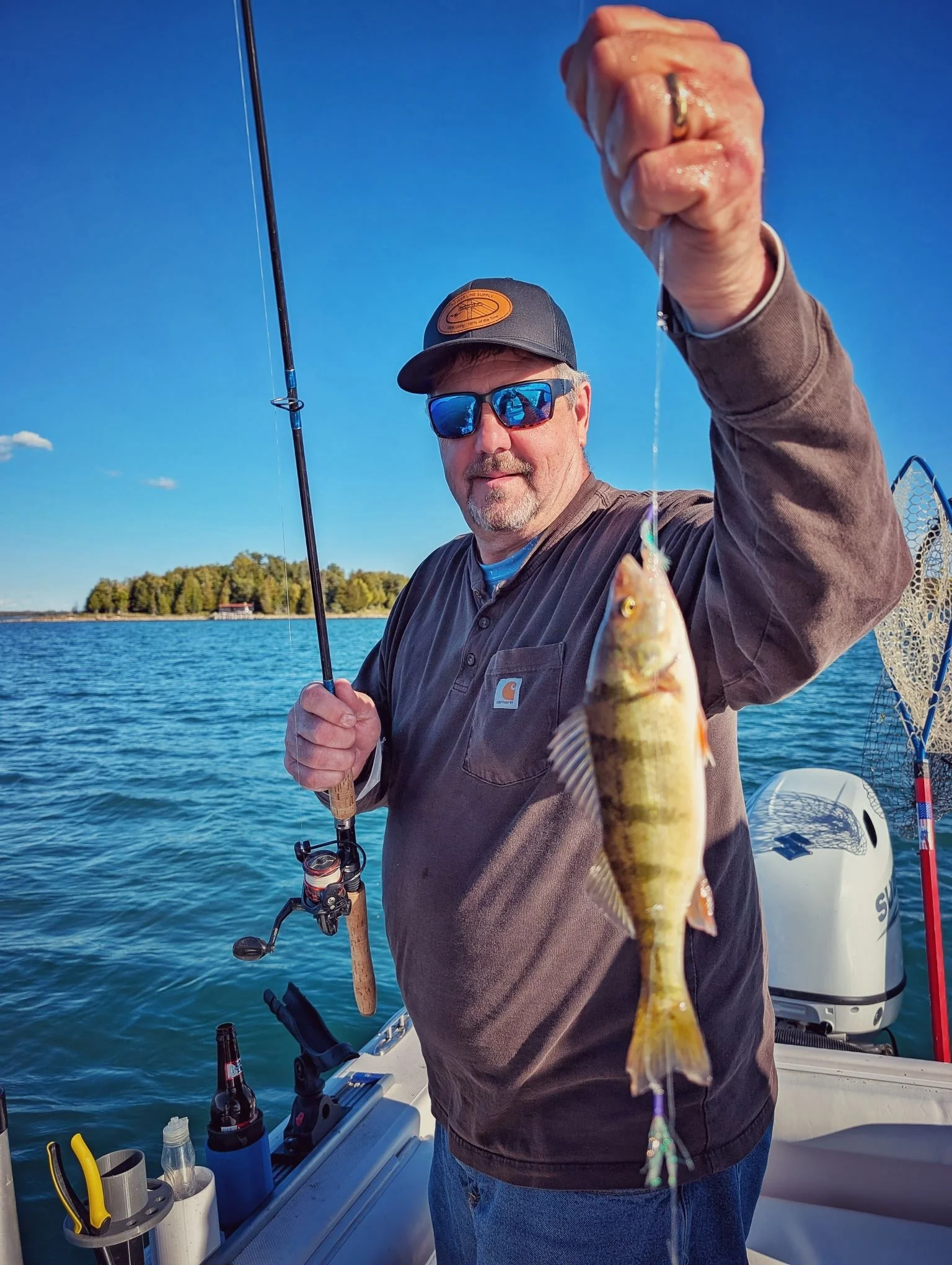  Successful perch fishing near the islands of DeTour and Drummond Island, Michigan, during a scenic fall charter with Reel Fish'n. 