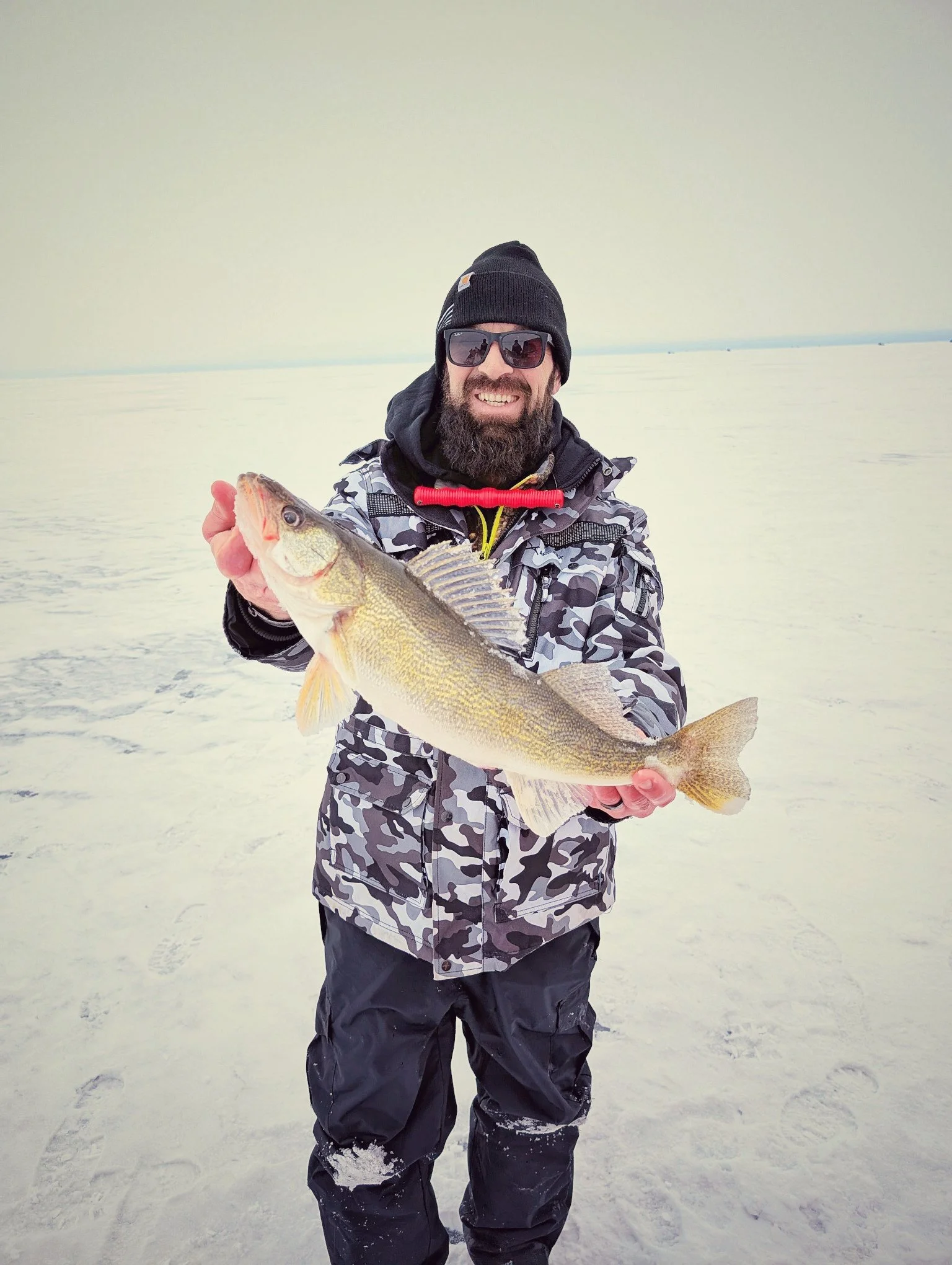  A successful day on the hard water of Saginaw Bay, pulling "gold bricks" through the ice with Reel Fish'n LLC.   