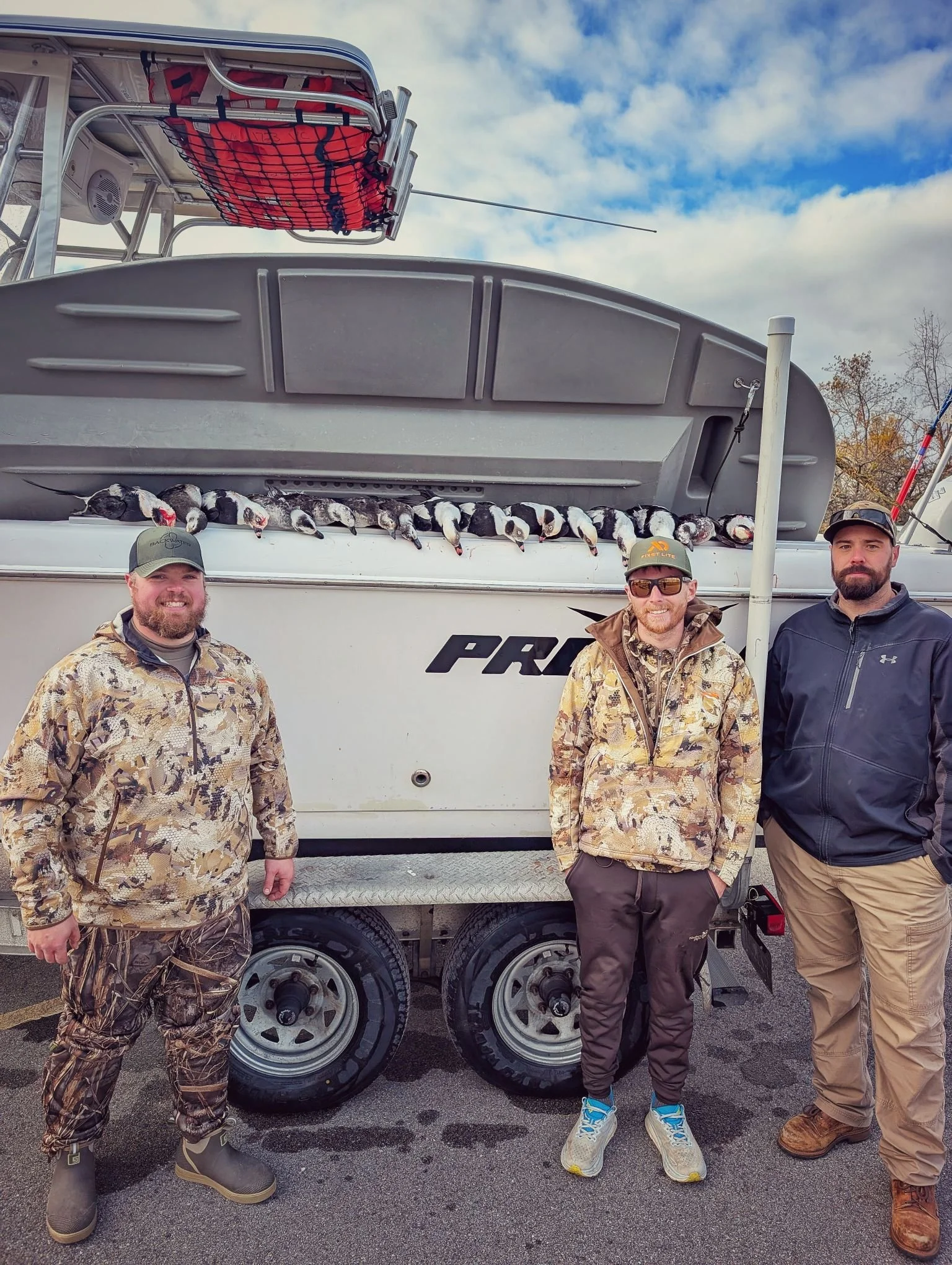 A successful morning for this crew of waterfowlers, bagging a diverse limit of long-tailed ducks and divers on the open water.