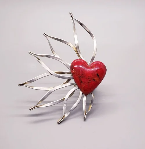 Red heart with silver rays
