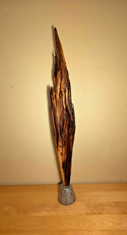 Tall narrow driftwood sculpture