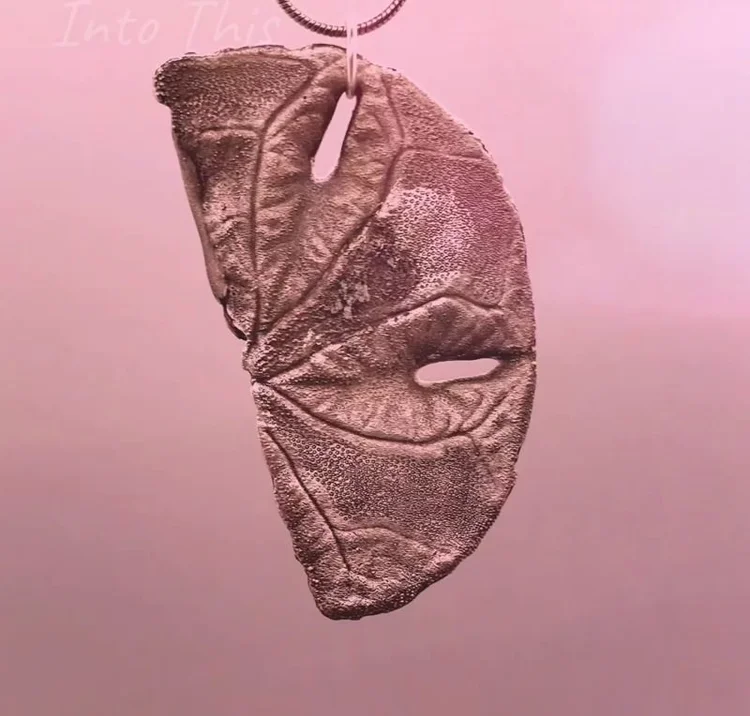 The sand dollar cast in metal