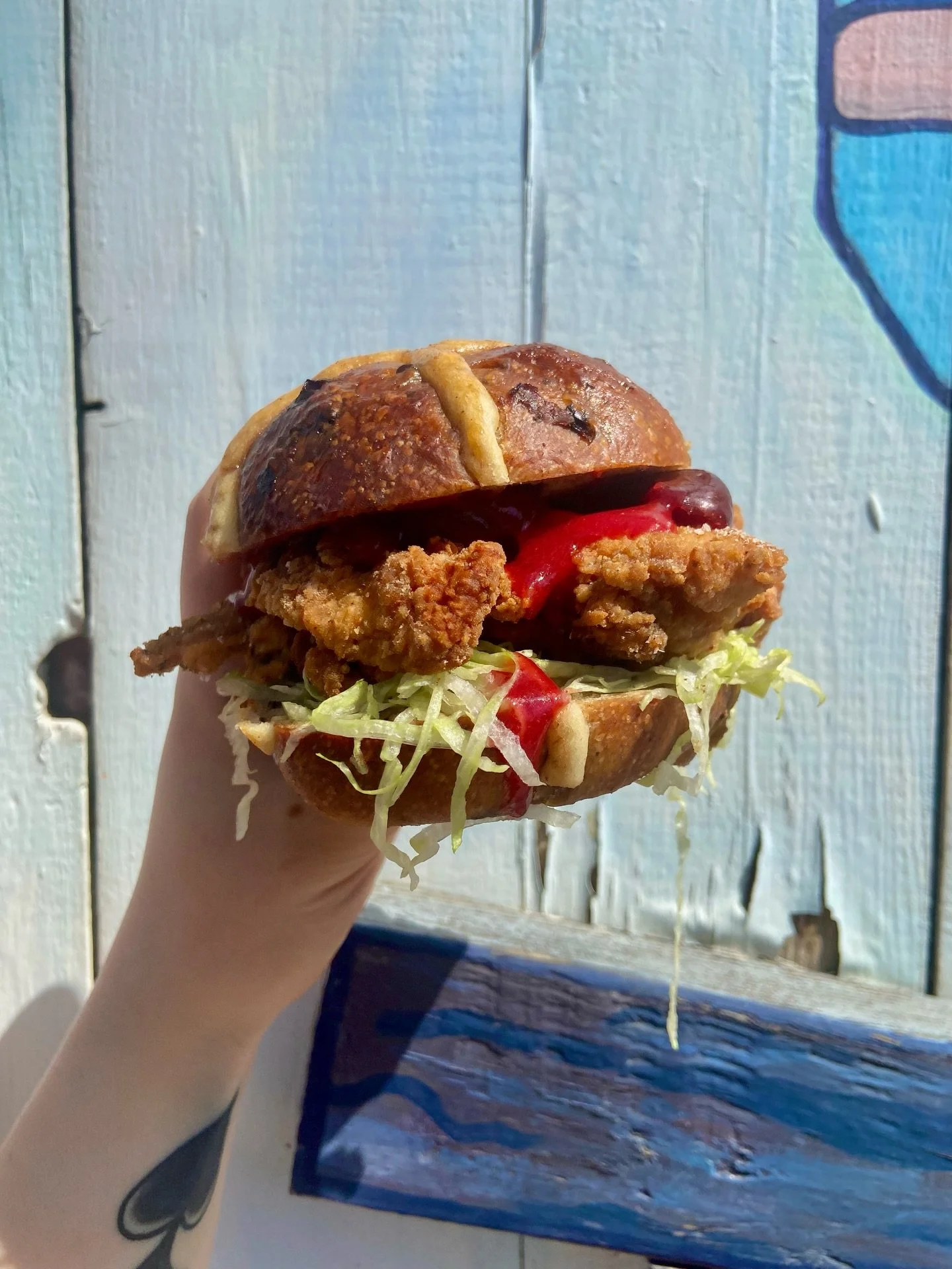 HOT CROSS FRIED CHICKEN SANDWICH 🐣 5-spice fried chicken on our hot cross bun with pickled plums, plum sauce and lettuce&hellip;crazy, but it works SO well. Available for lunch after 11:30 tomorrow!! 🌼

#torontofood #yyzfood #torontorestaurants #to