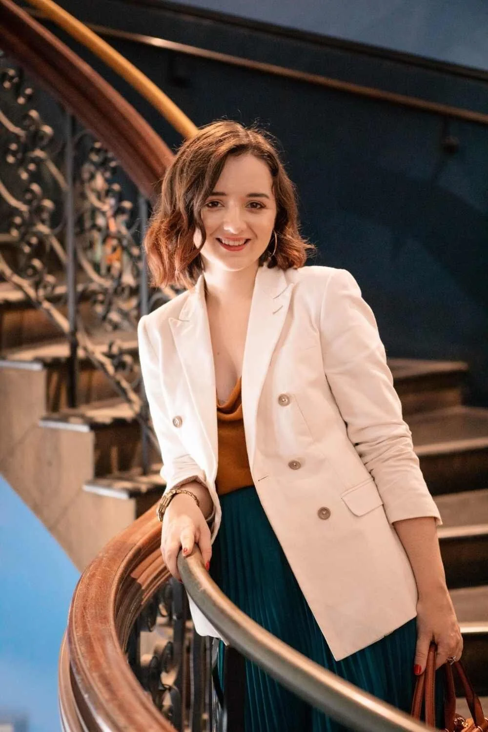 Alarna Hope shopping in David Jones in Sydney City wearing white stylish blazer and leather handbag