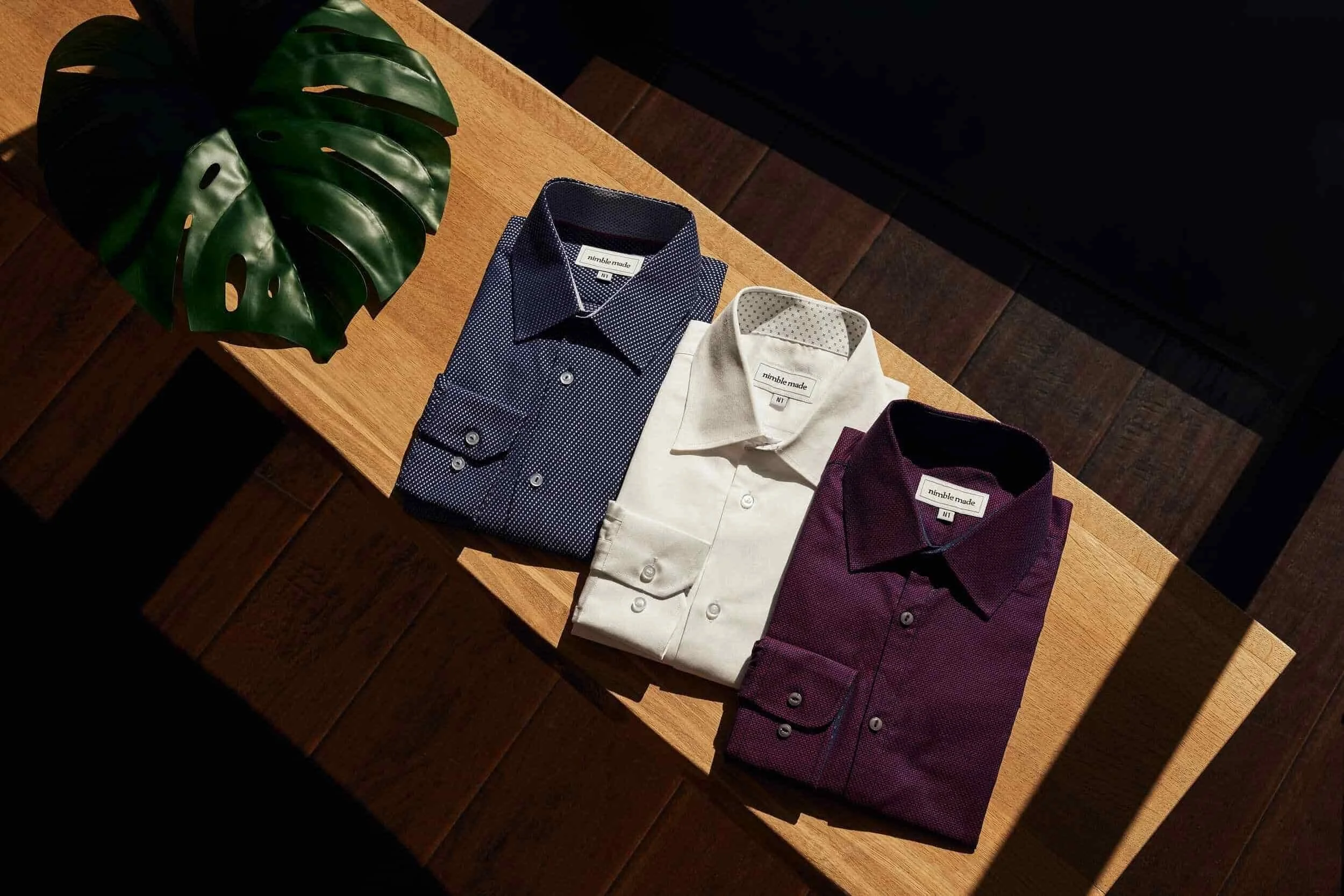 Blue, white and burgundy mens shirts.