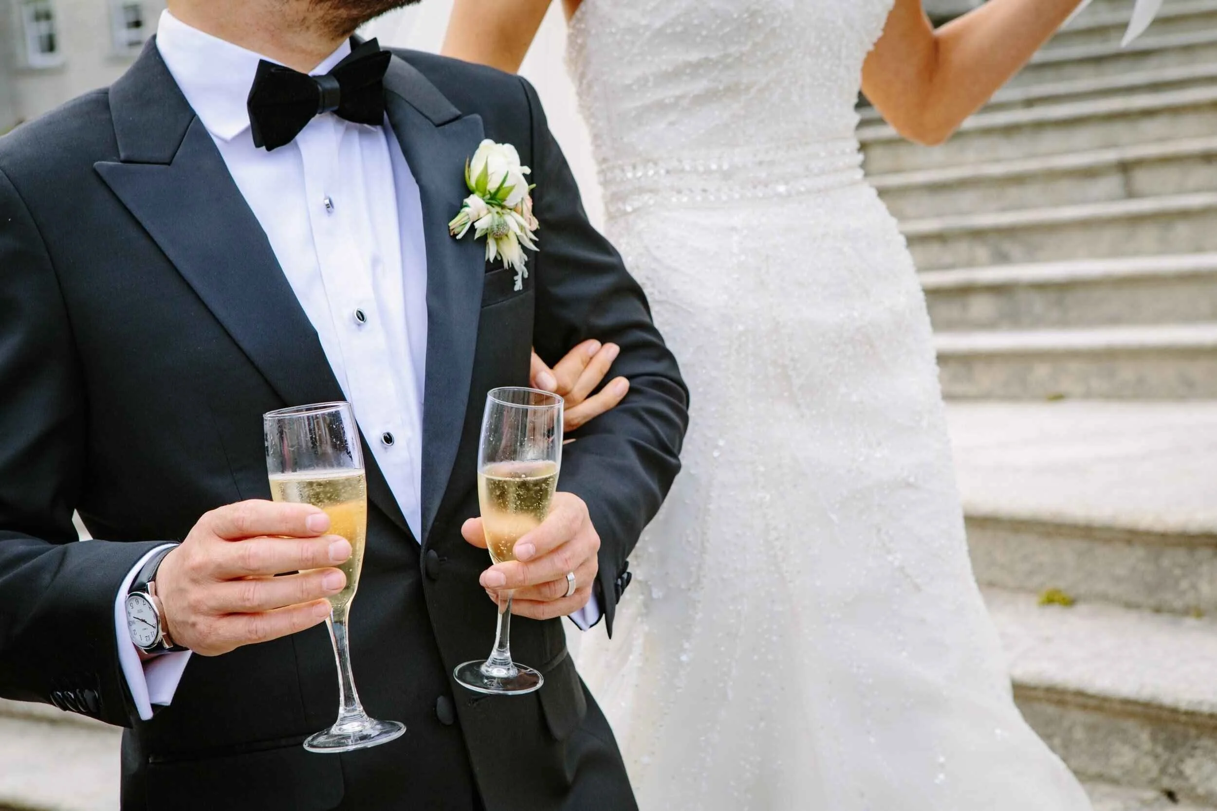 Bride and Groom with champagne celebrating their wedding