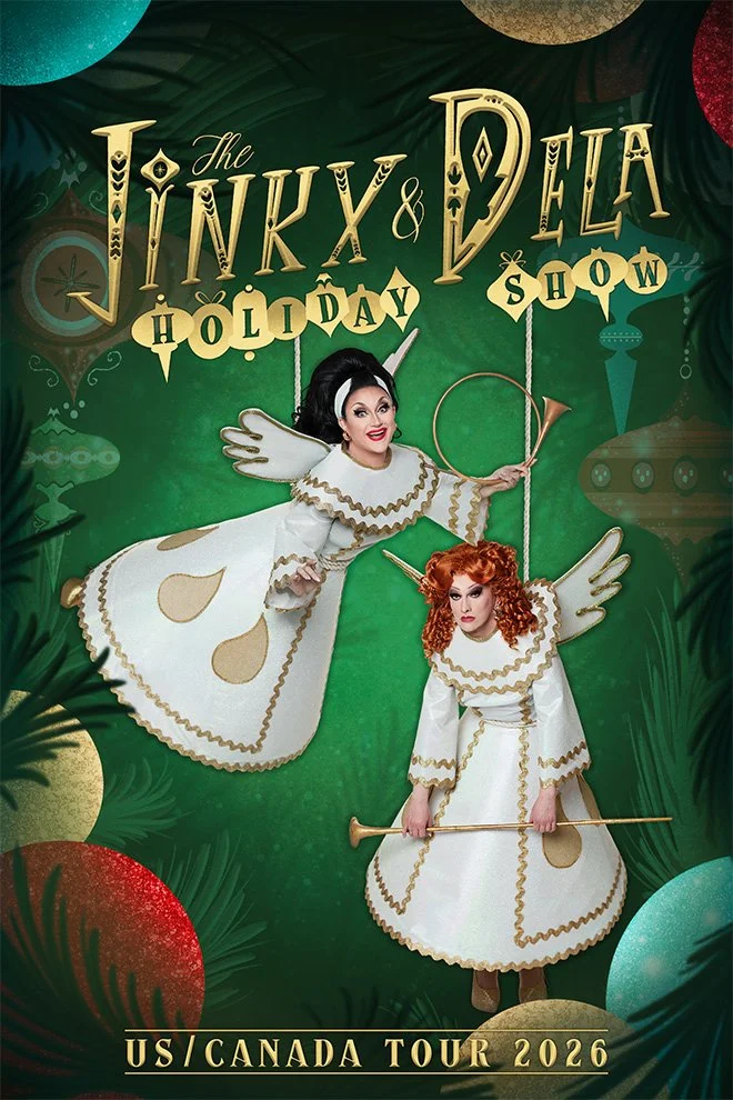 Jinkx and DeLa are dressed like angel ornaments, wearing white dresses with gold rick rack trim, and are hanging from a tree.