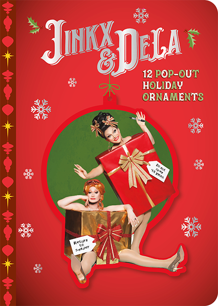 Cover for Jinkx & DeLa: 12 Pop-Out Holiday Ornaments. Jinkx and DeLa are wearing Christmas present costumes on a red cover with foil snowflakes.