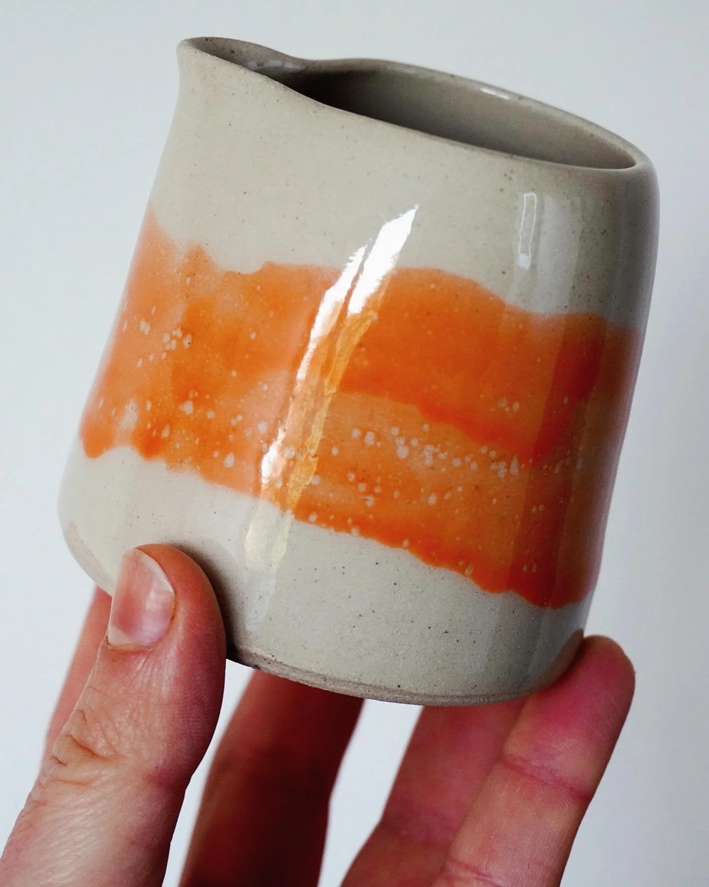 A flash of orange 🍊 a bright summery addition to this transparent gloss glaze. When applying it I gave a few layers to create a kind of watercolour effect across the surface. It&rsquo;s tempting to try this with a few other colours too. #tableware #