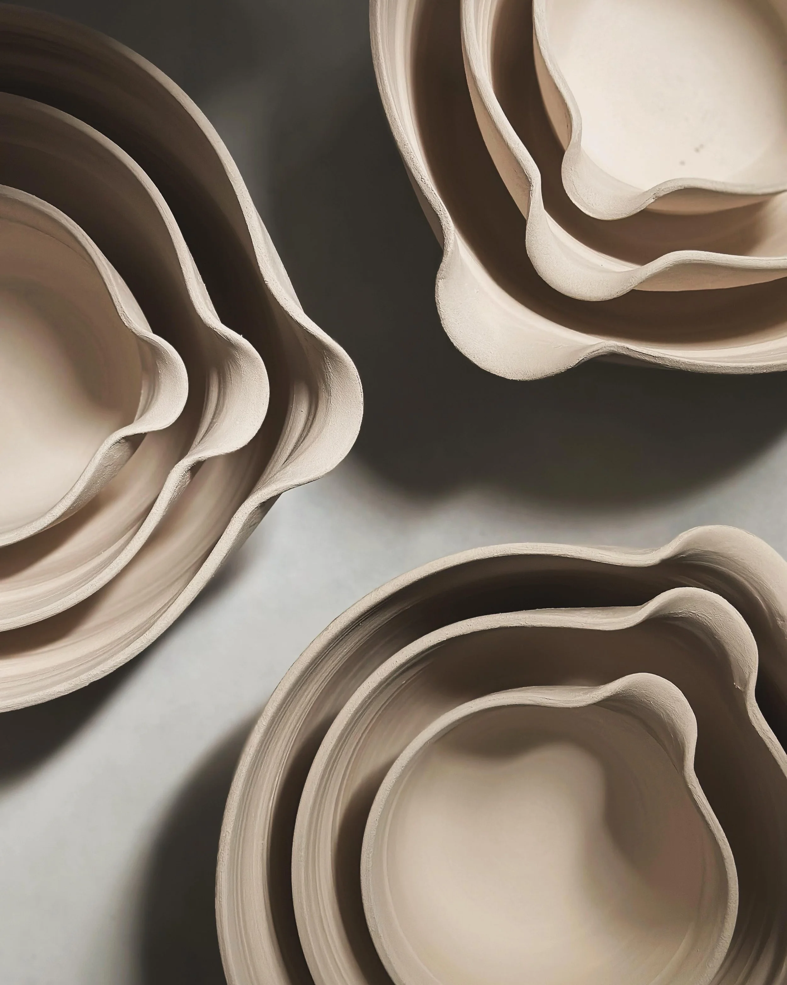 I wasn&rsquo;t going to post these photos to the grid since they&rsquo;re a work in progress. For some reason I often find photos of the studio don&rsquo;t get many likes but the lighting is interesting. These are sets of stacking pouring bowls that 