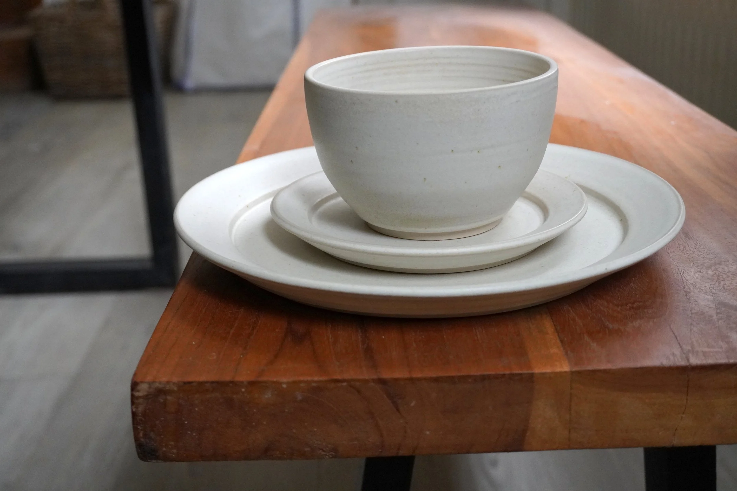 The plates photographed on a dark background for contrast