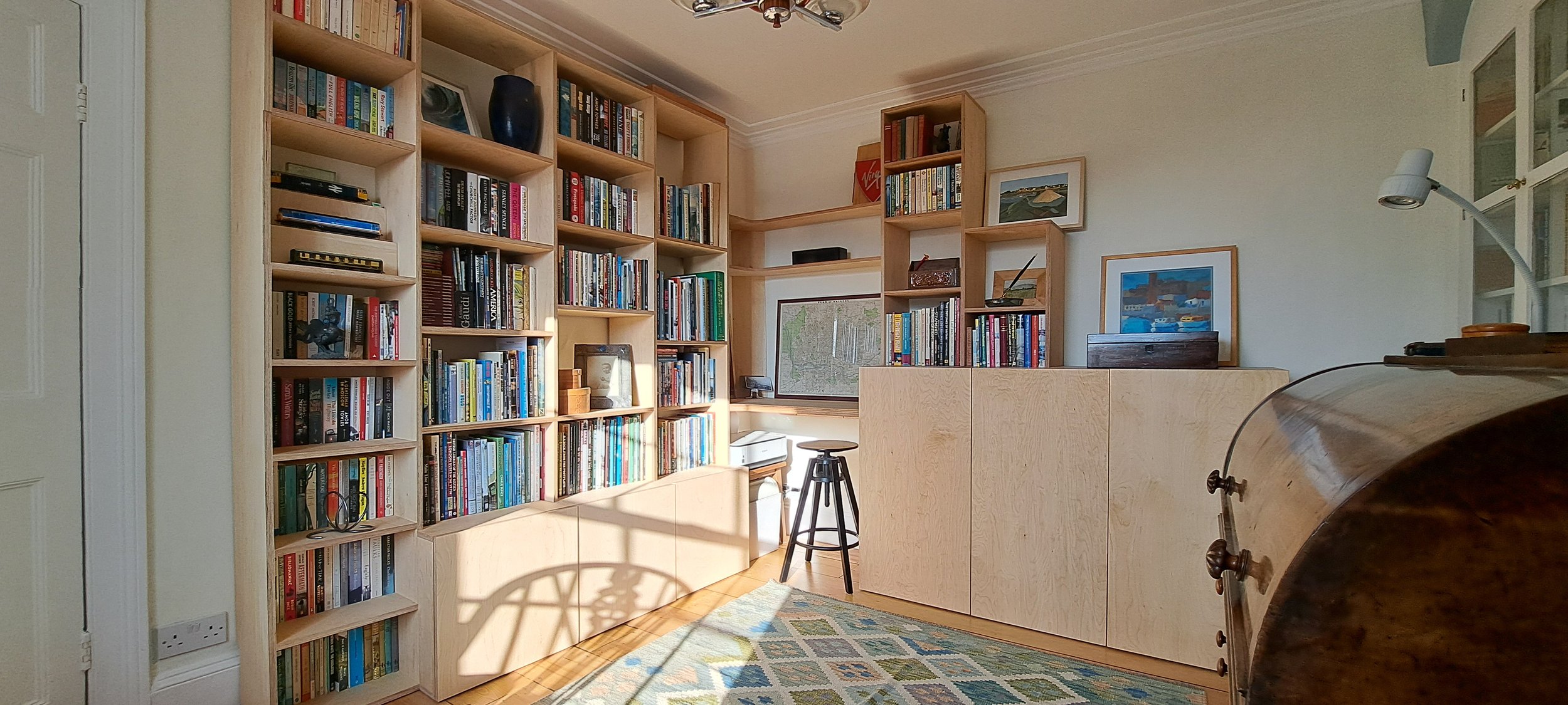 Birch Ply Bookcase and Cupboards with a connecting Desk. Custom built.