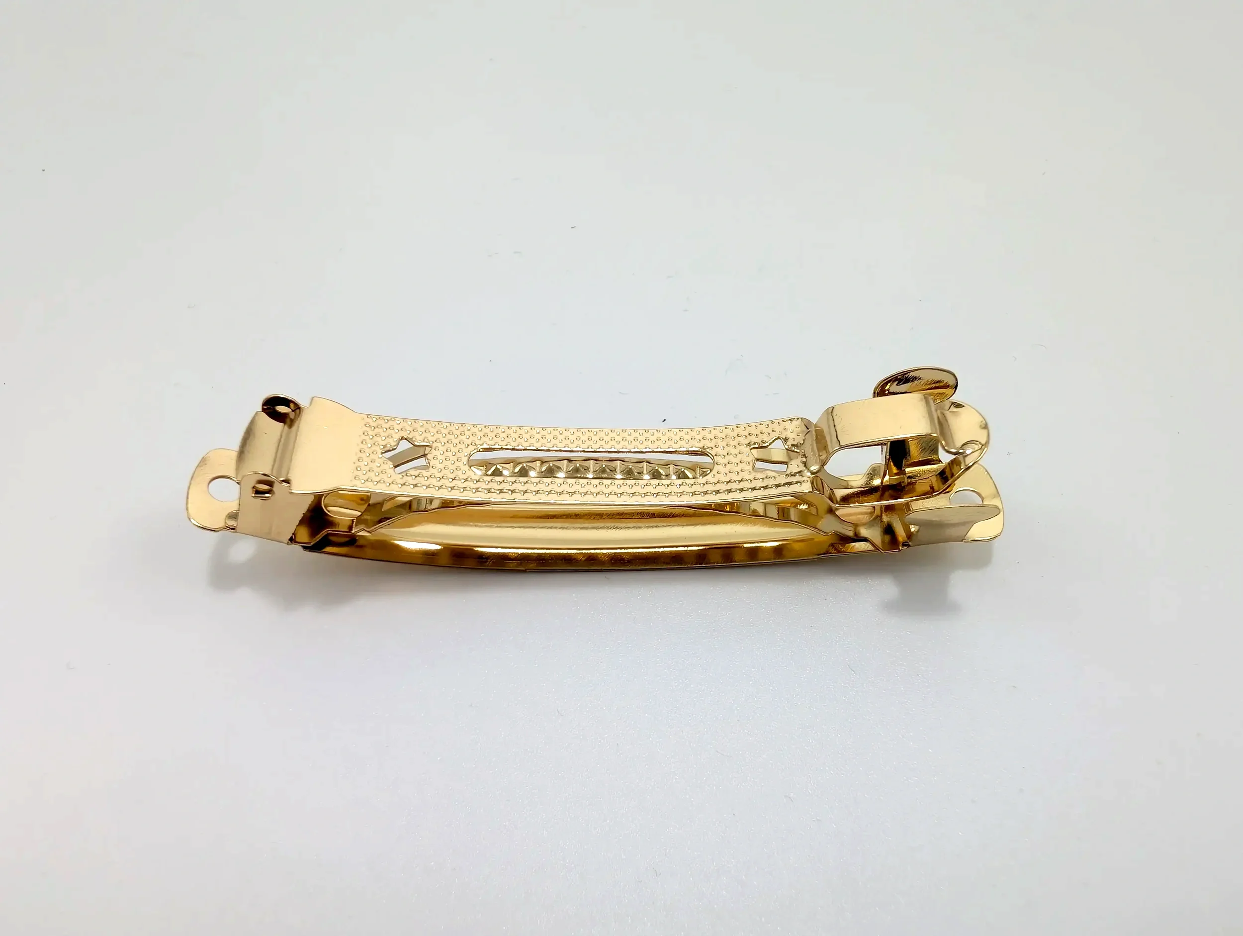 barrette en métal doré